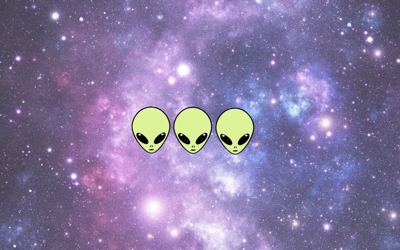 Logo art featuring a friendly alien Wallpaper