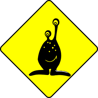 Alien_ Sign_ Yellow_ Background PNG