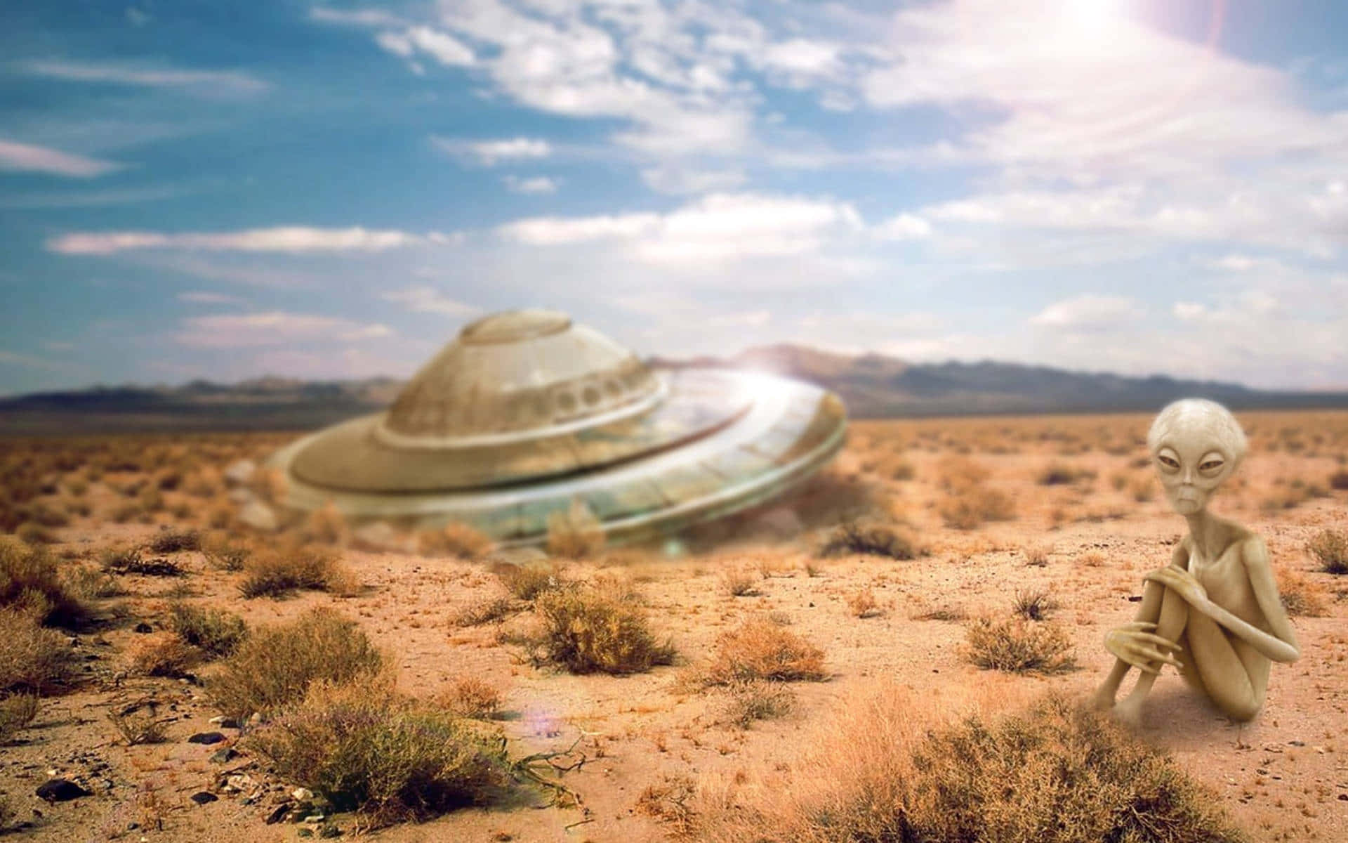 Alien Stranded In The Desert Wallpaper