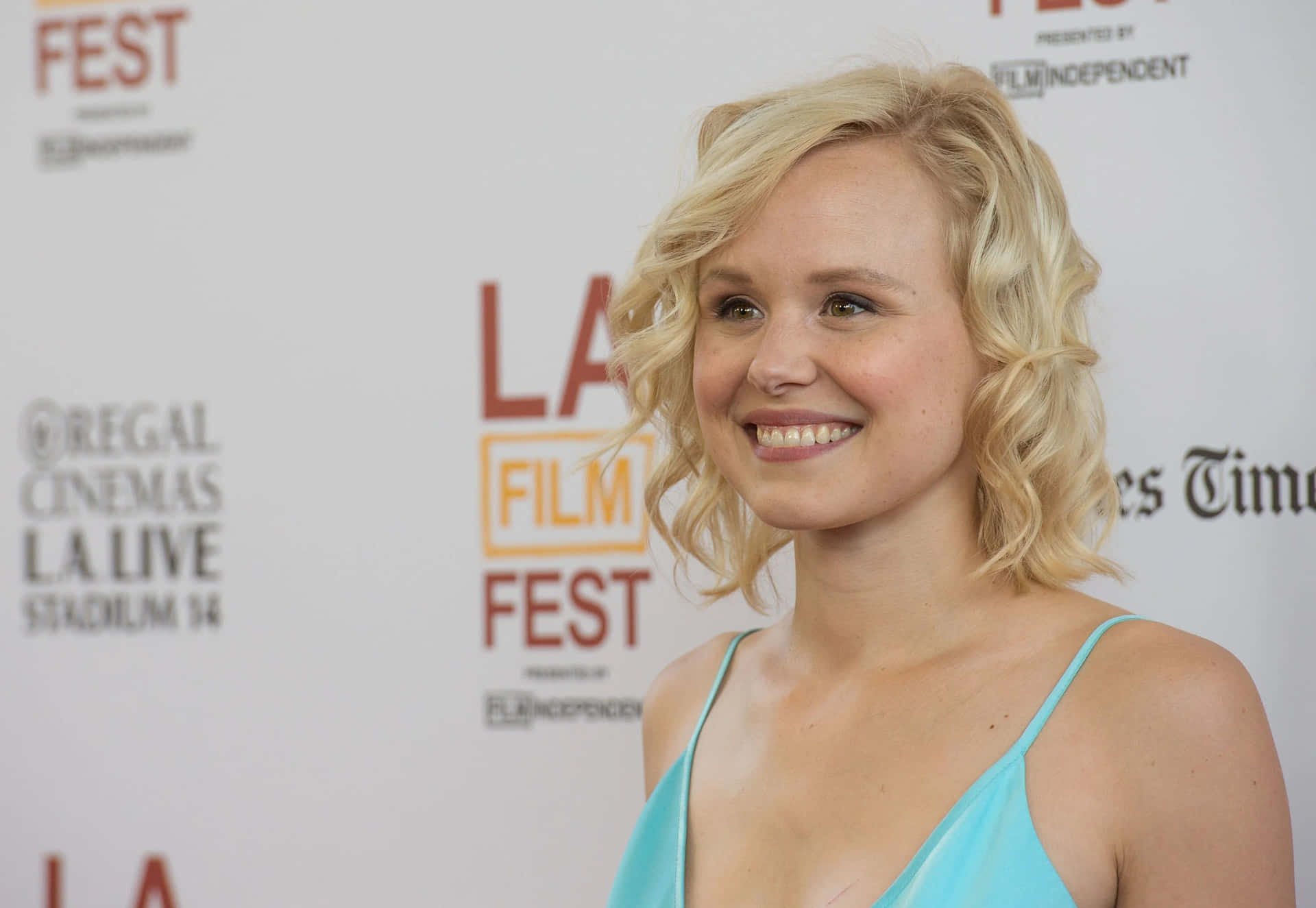 Alison Pill radiant in a stylish outfit Wallpaper