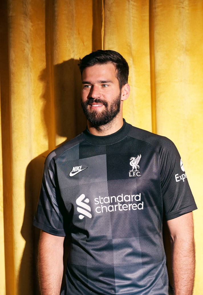 alisson becker black and gold jersey