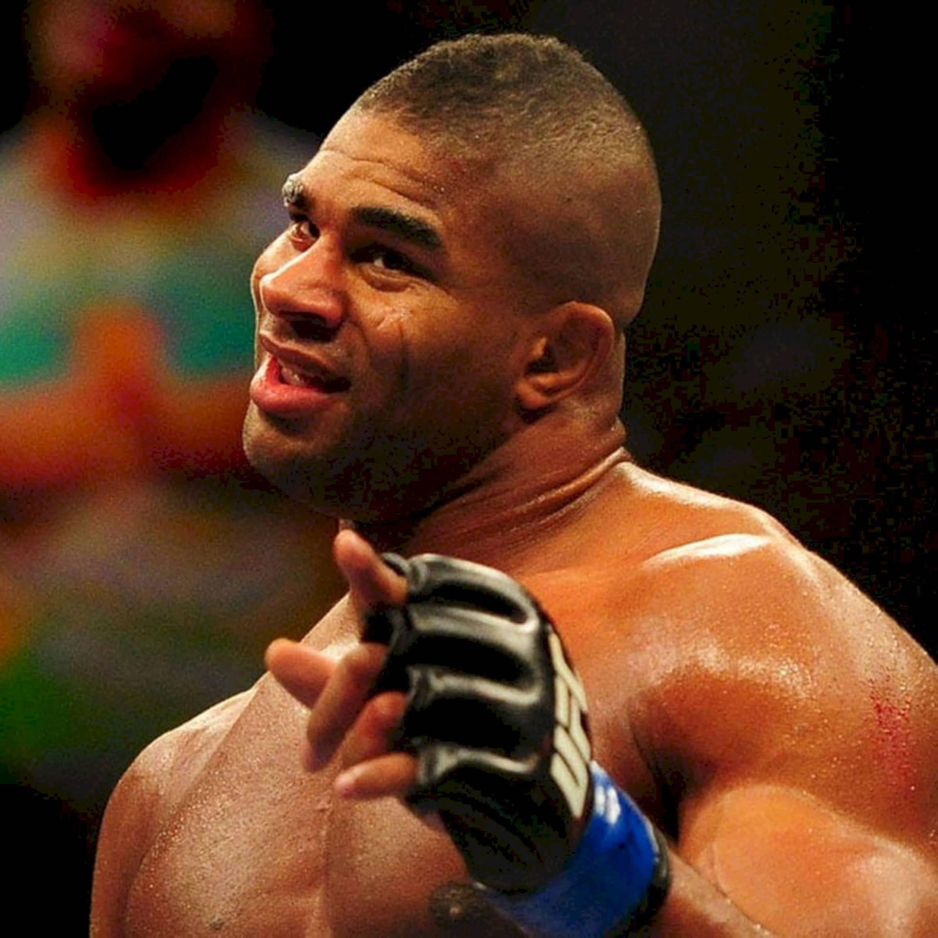 Alistair Overeem Pointing With Gloved Hand Wallpaper