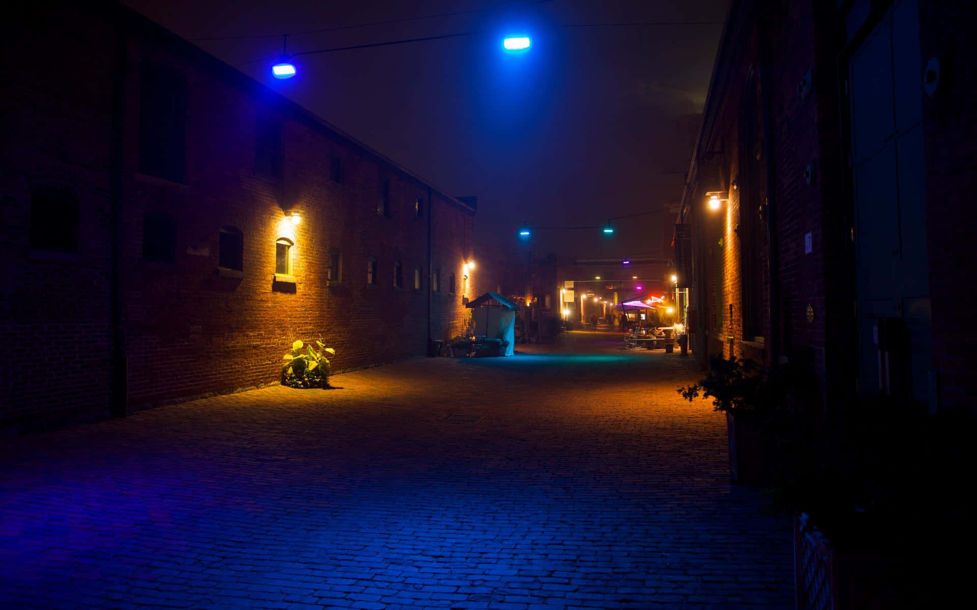 A Brick Street With Blue Lights