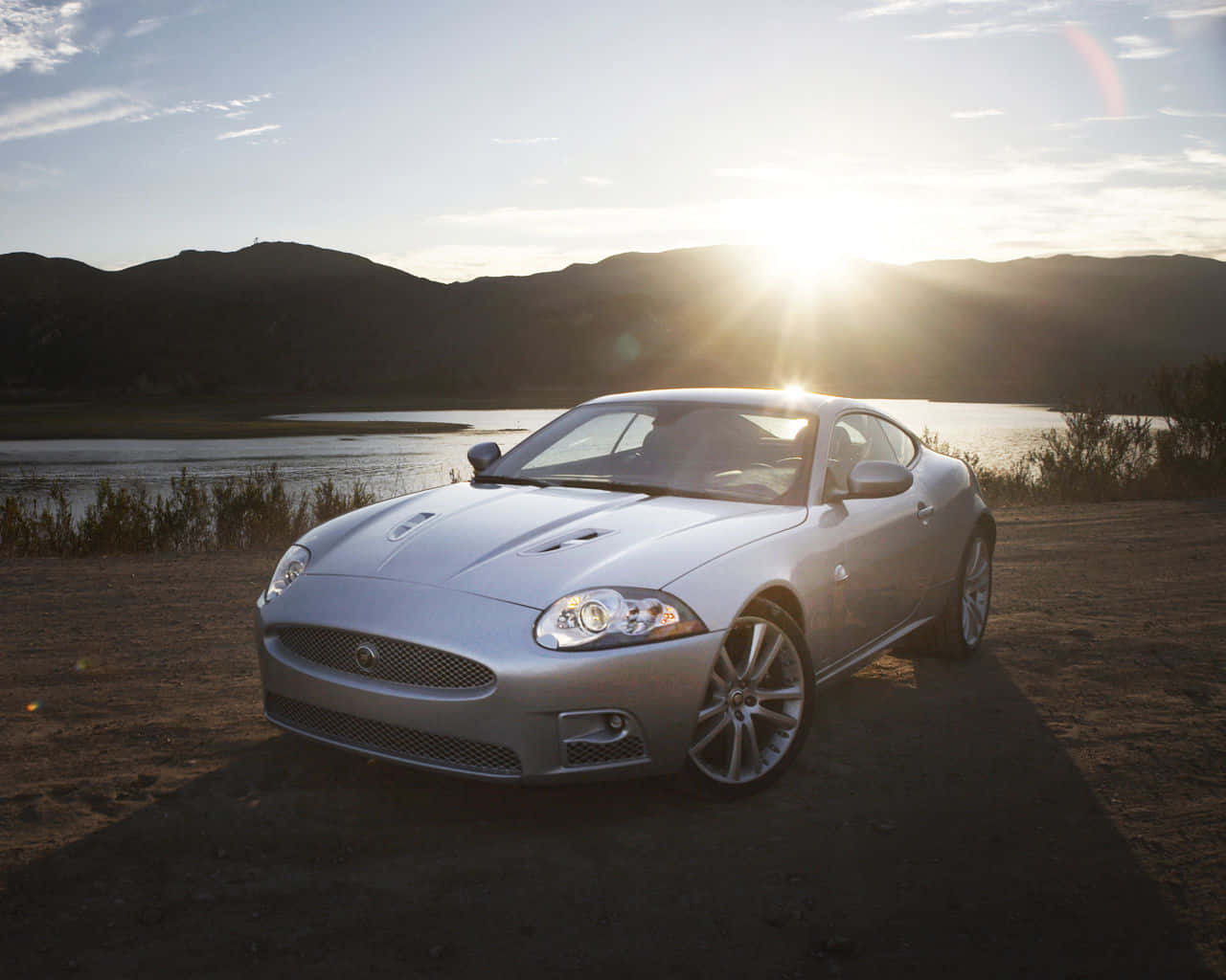 Alluring Speed - A Silver Jaguar Xk Wallpaper