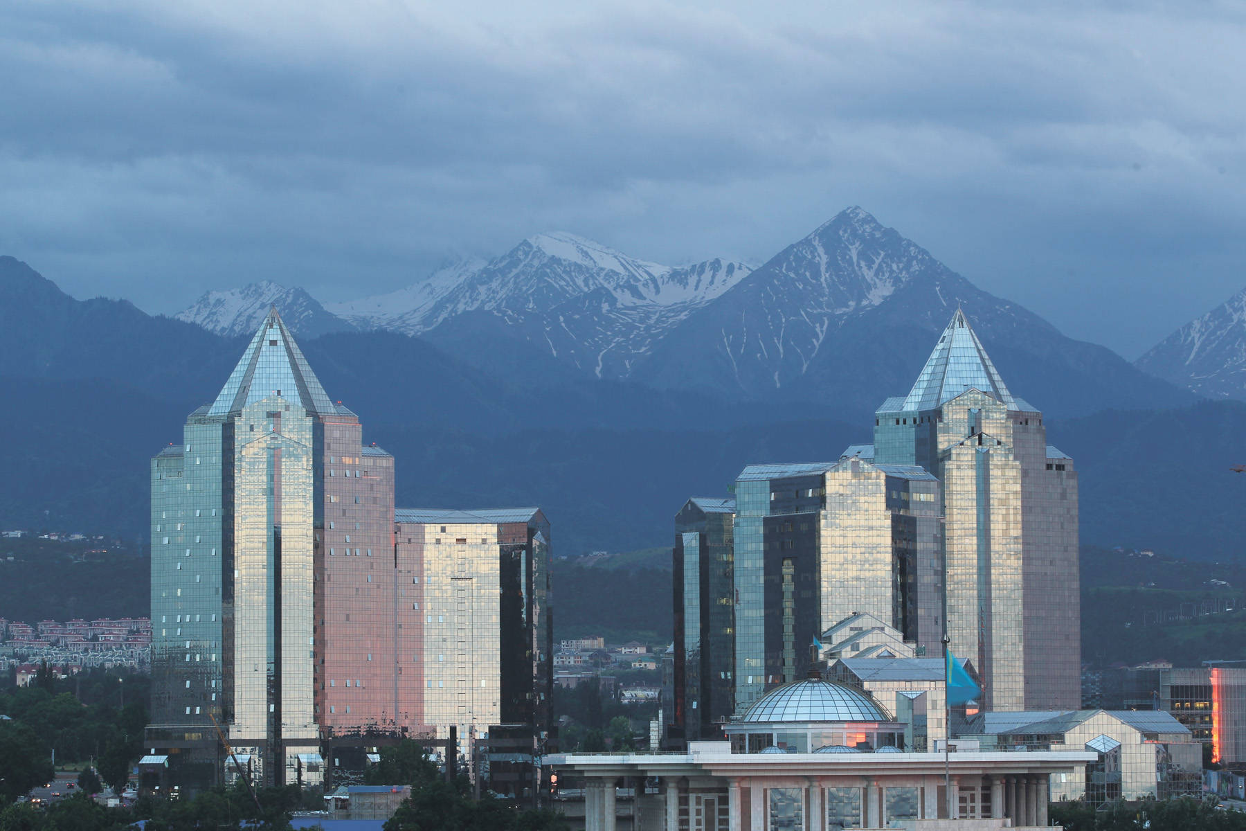 Almaty Buildings Against Mountains Wallpaper