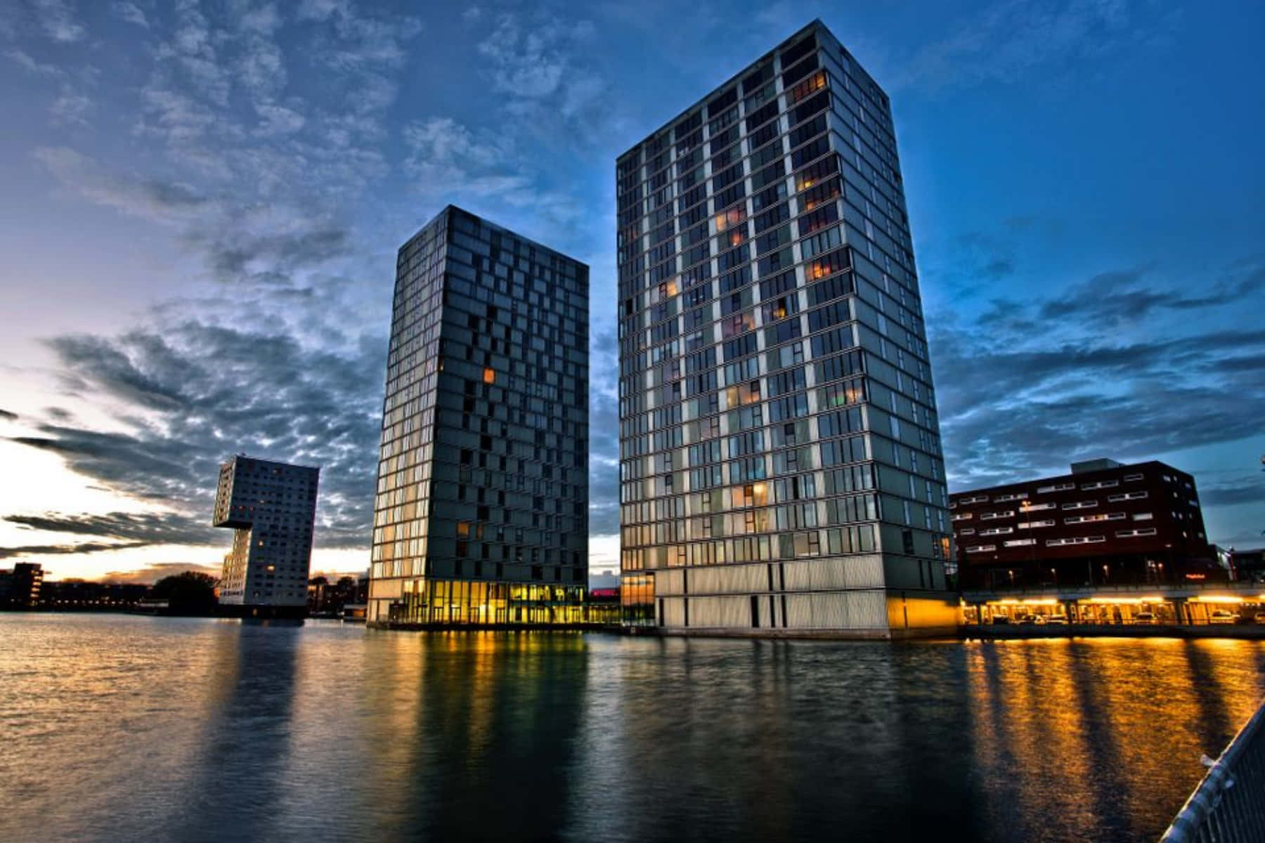 Almere Waterfront Skyscrapersat Dusk Wallpaper