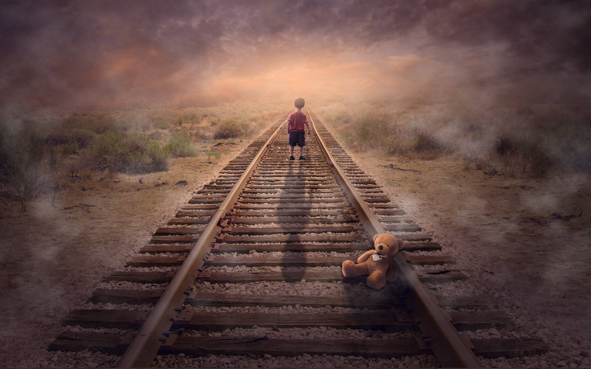 Alone Little Boy On Railway Background