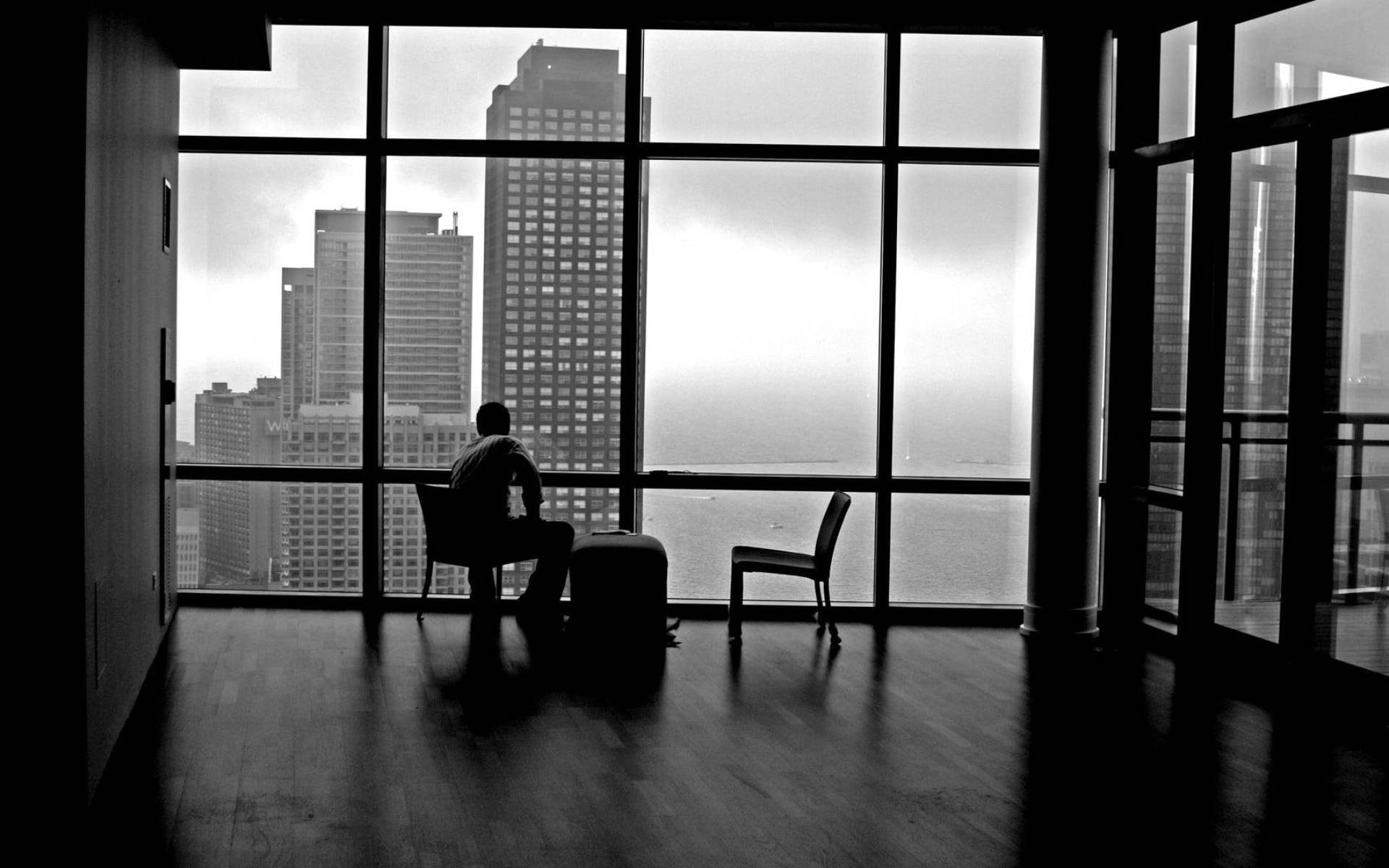 Alone Man By The Window Background