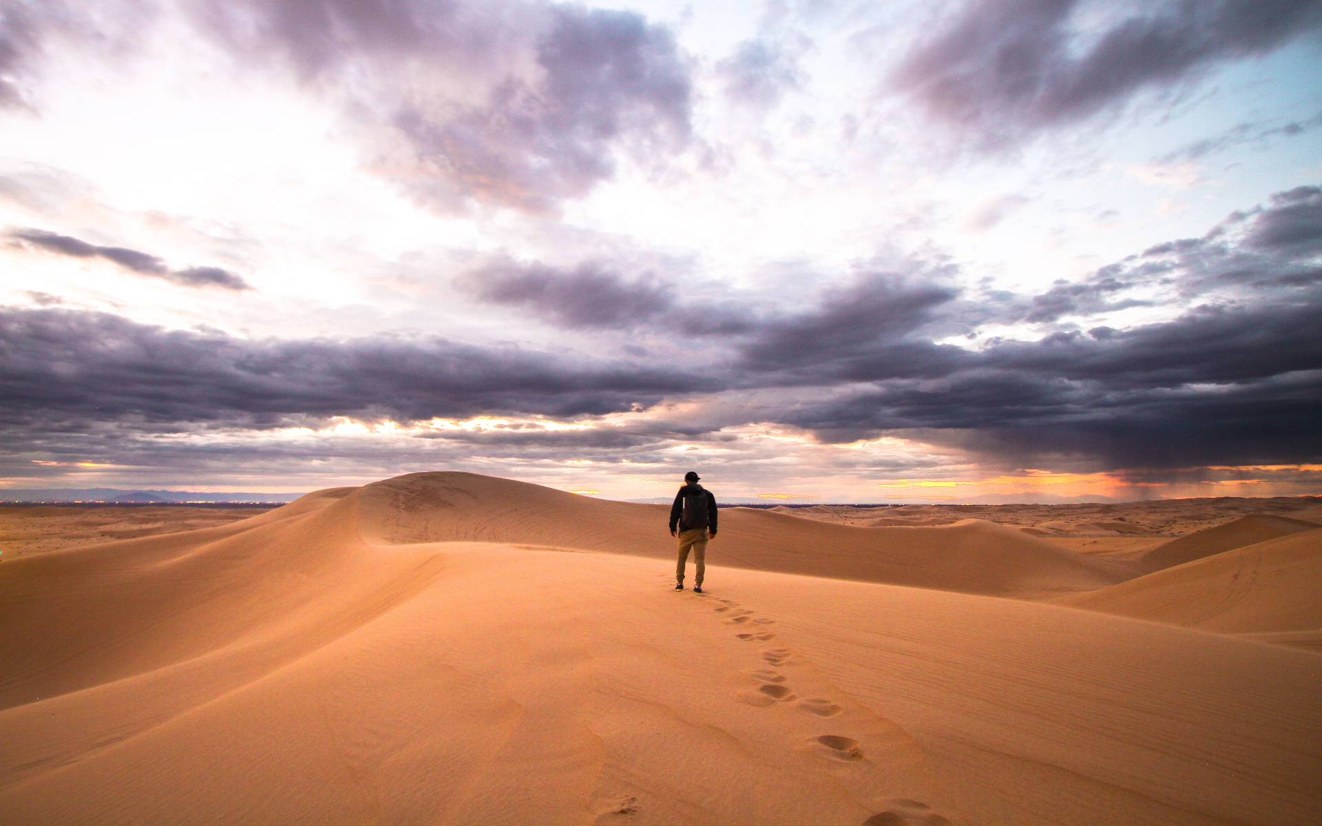 Alone Man In The Desert Background