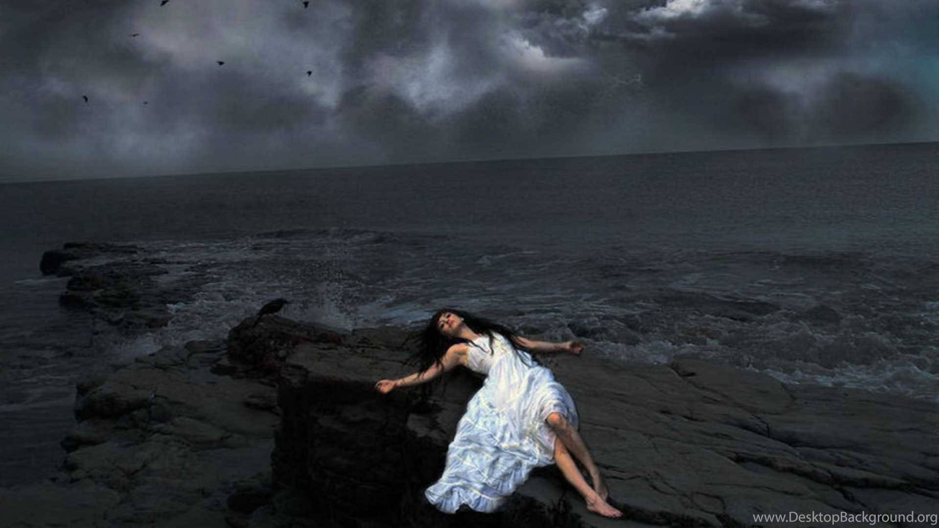 Alone Woman Lying Beside Ocean Background