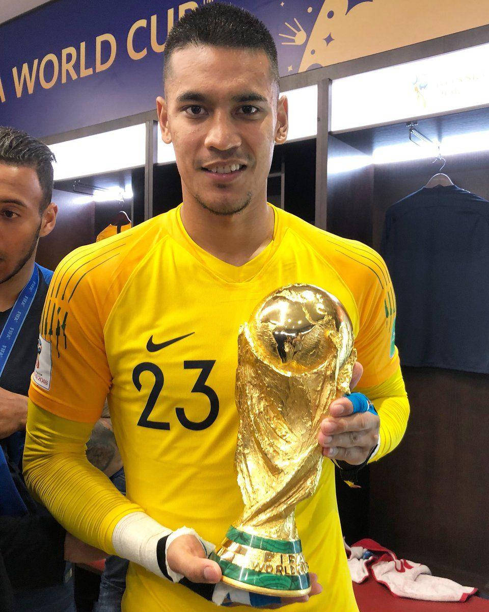 Alphonse Areola Triumphantly Holding a Trophy Wallpaper