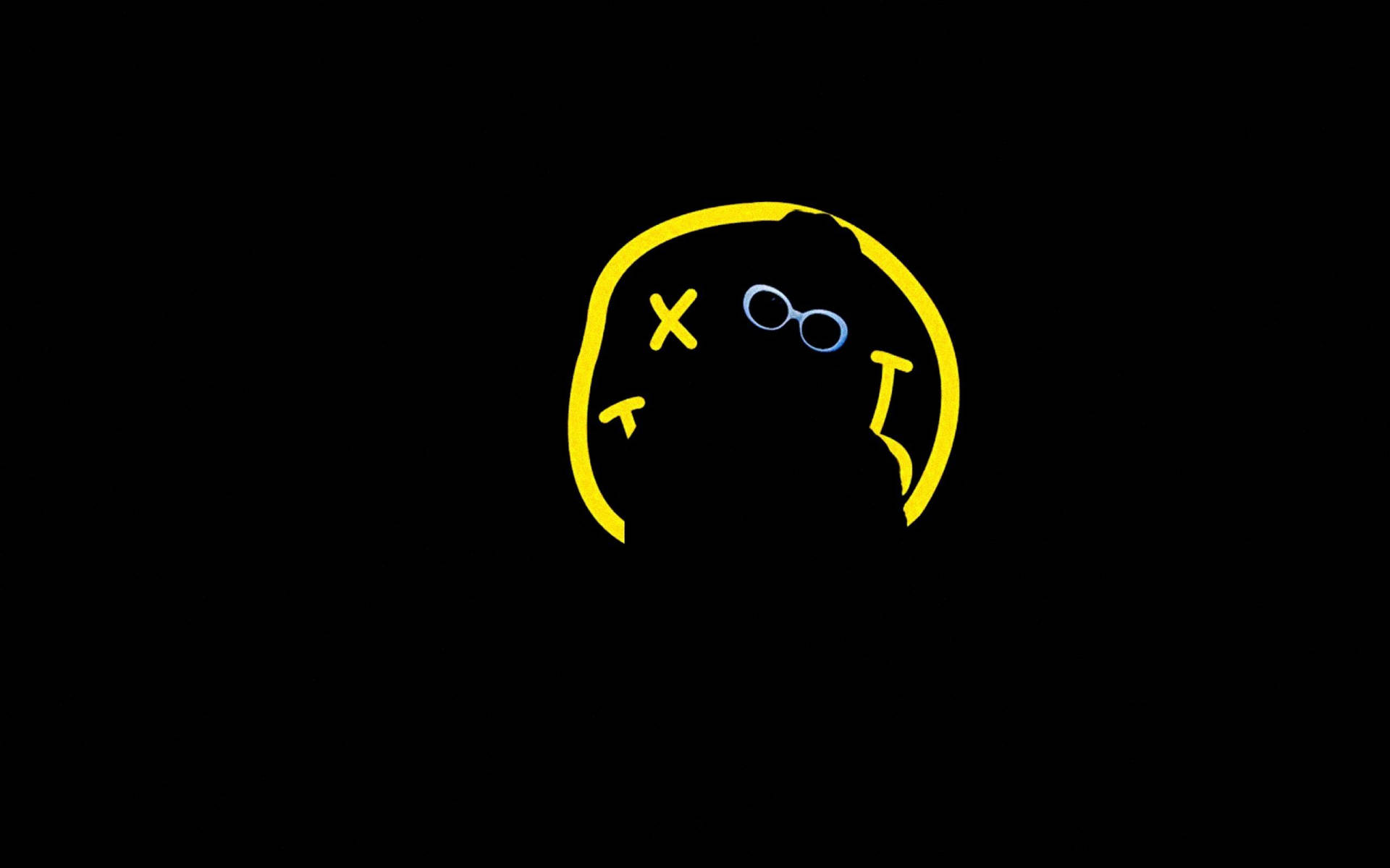 A Black Background With A Yellow And Blue Face Wallpaper