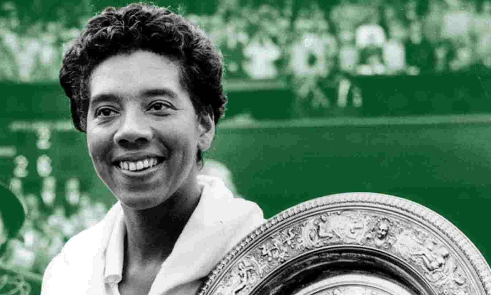 Althea Gibson Holding her Grand Slam Trophies Wallpaper