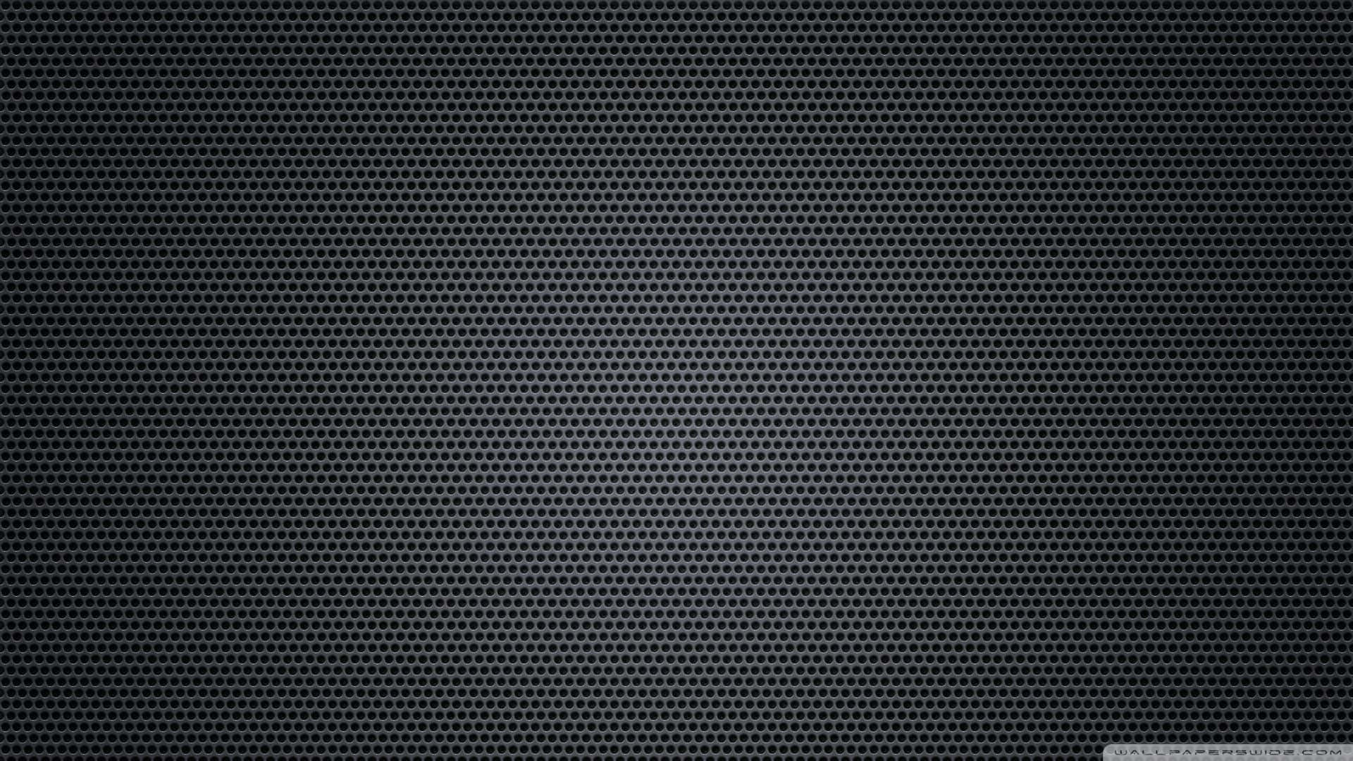 A Black Background With A Pattern Of Lines