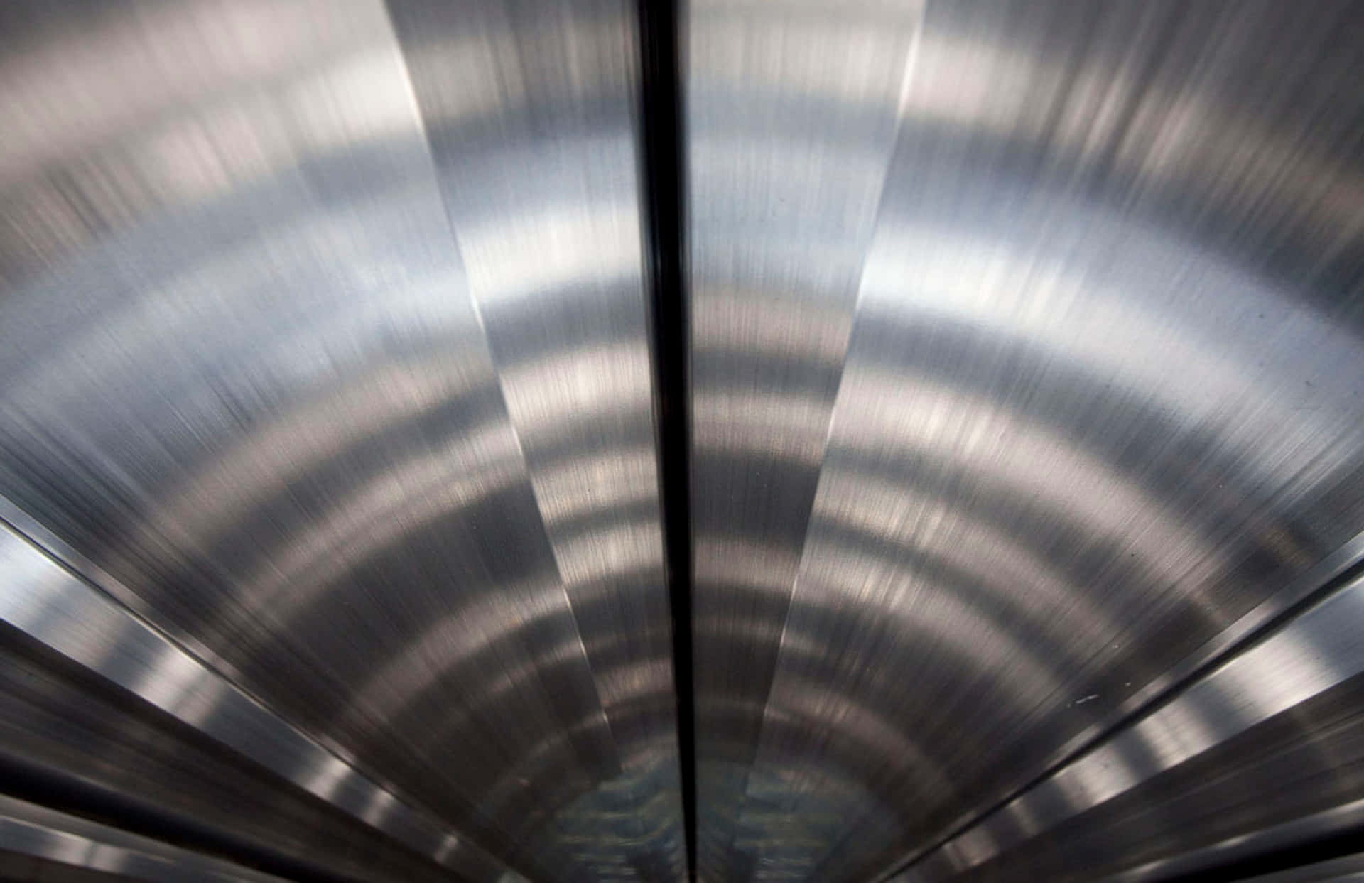 A Close Up Of A Metal Tunnel