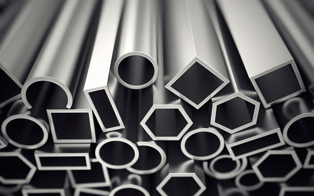 A Close Up Of A Pile Of Metal Tubes