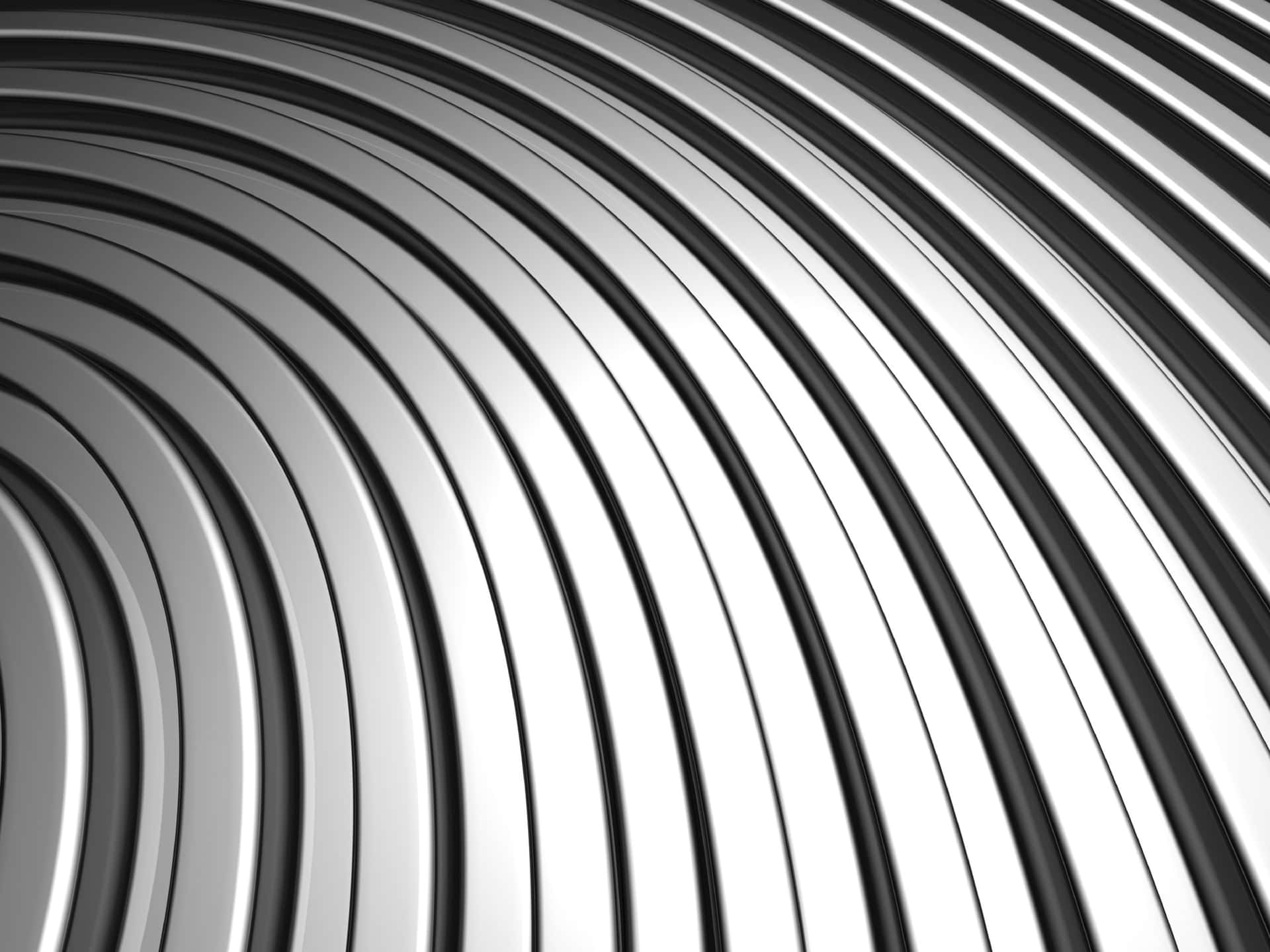 A Black And White Image Of A Metal Background