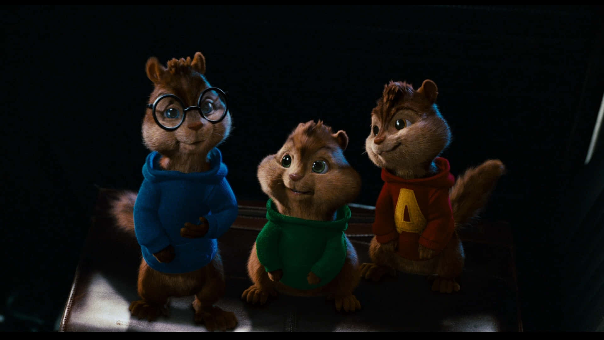 Alvinund Die Chipmunks Filmfiguren, Simon, Theodore Und Alvin In Einem Nostalgischen Moment.