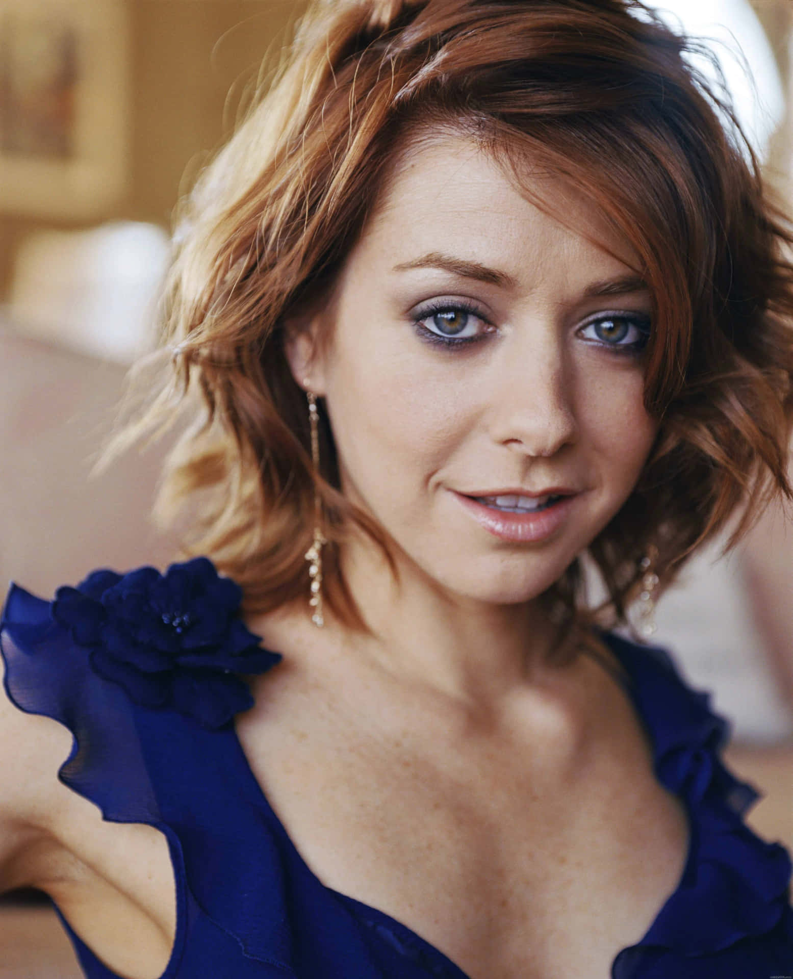 Alyson Hannigan smiling in a stunning photoshoot Wallpaper