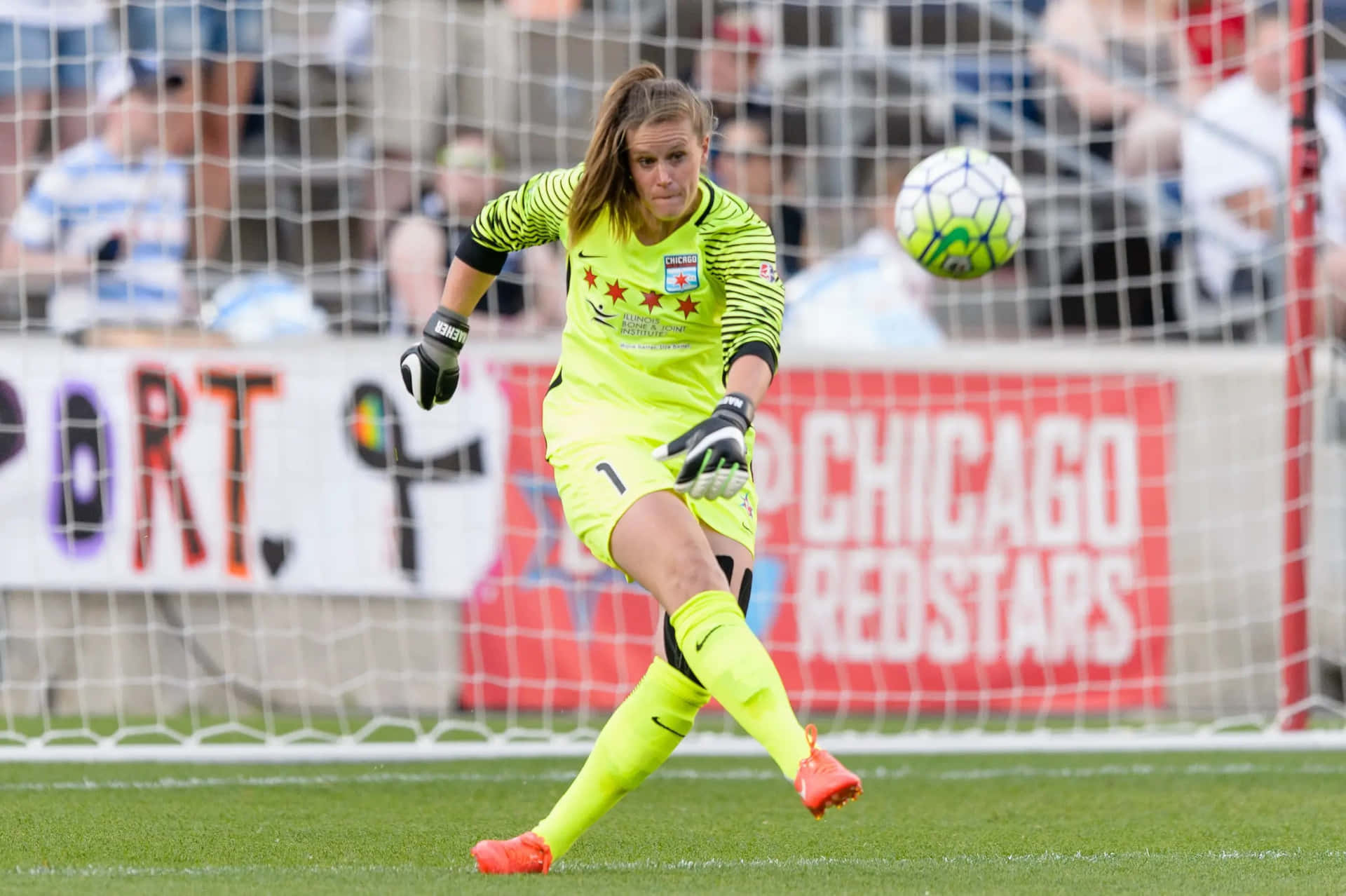 Alyssa Naeher In Action On The Soccer Field Wallpaper