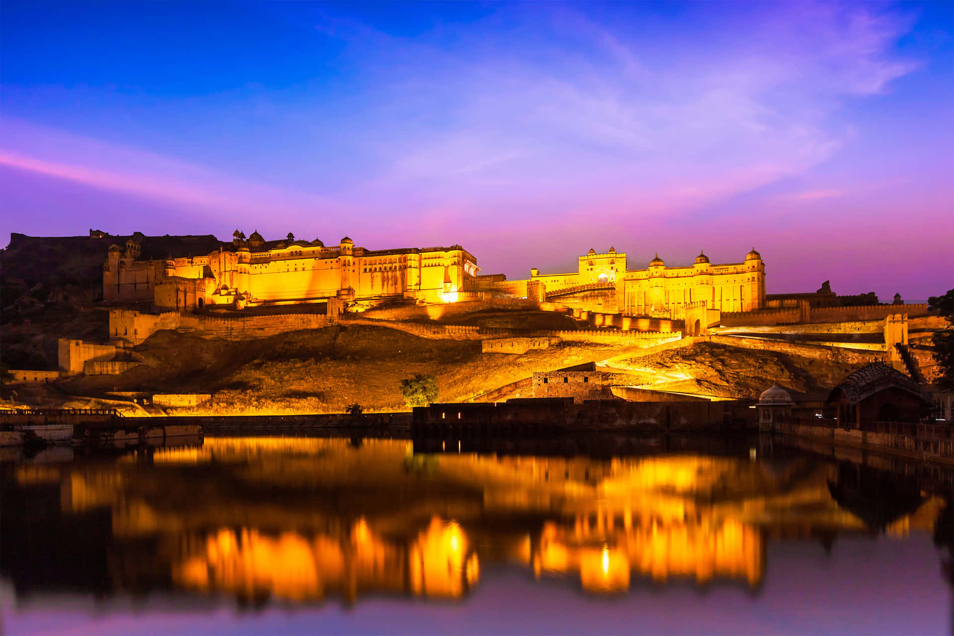 Amer Fort Sitting Pretty On Top Of A Hill Wallpaper