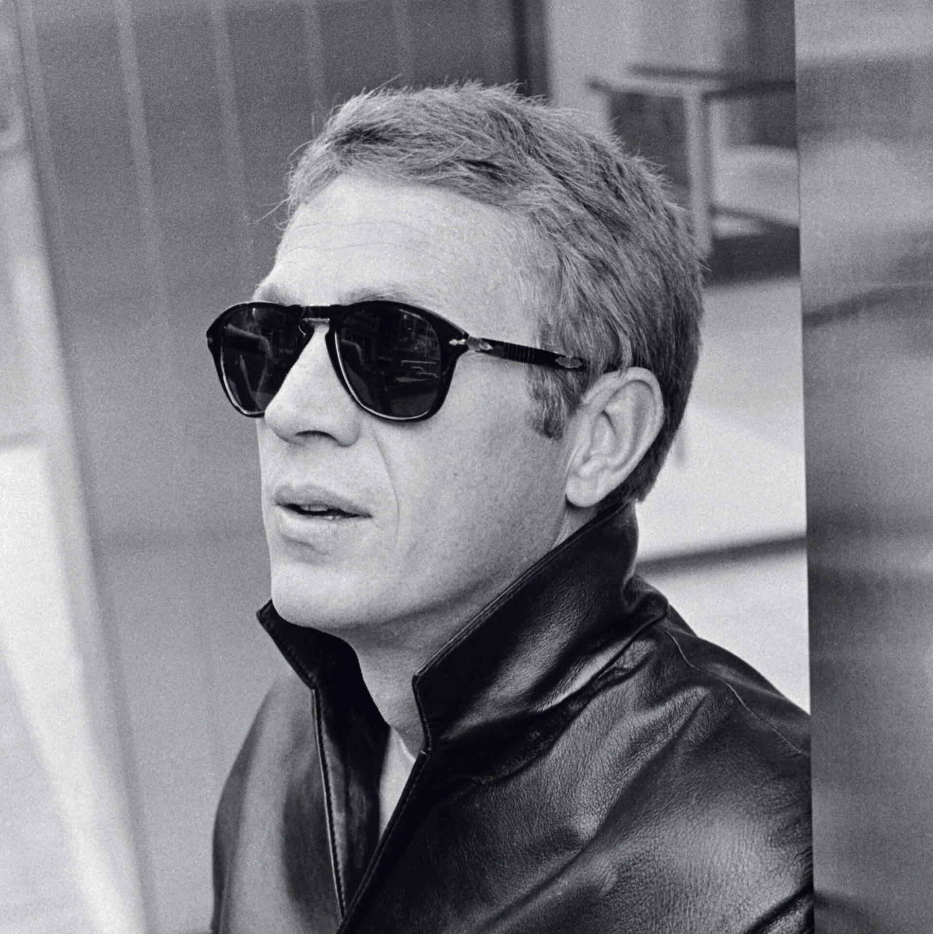 American Actor Steve McQueen In Limited Edition Sunglasses Wallpaper