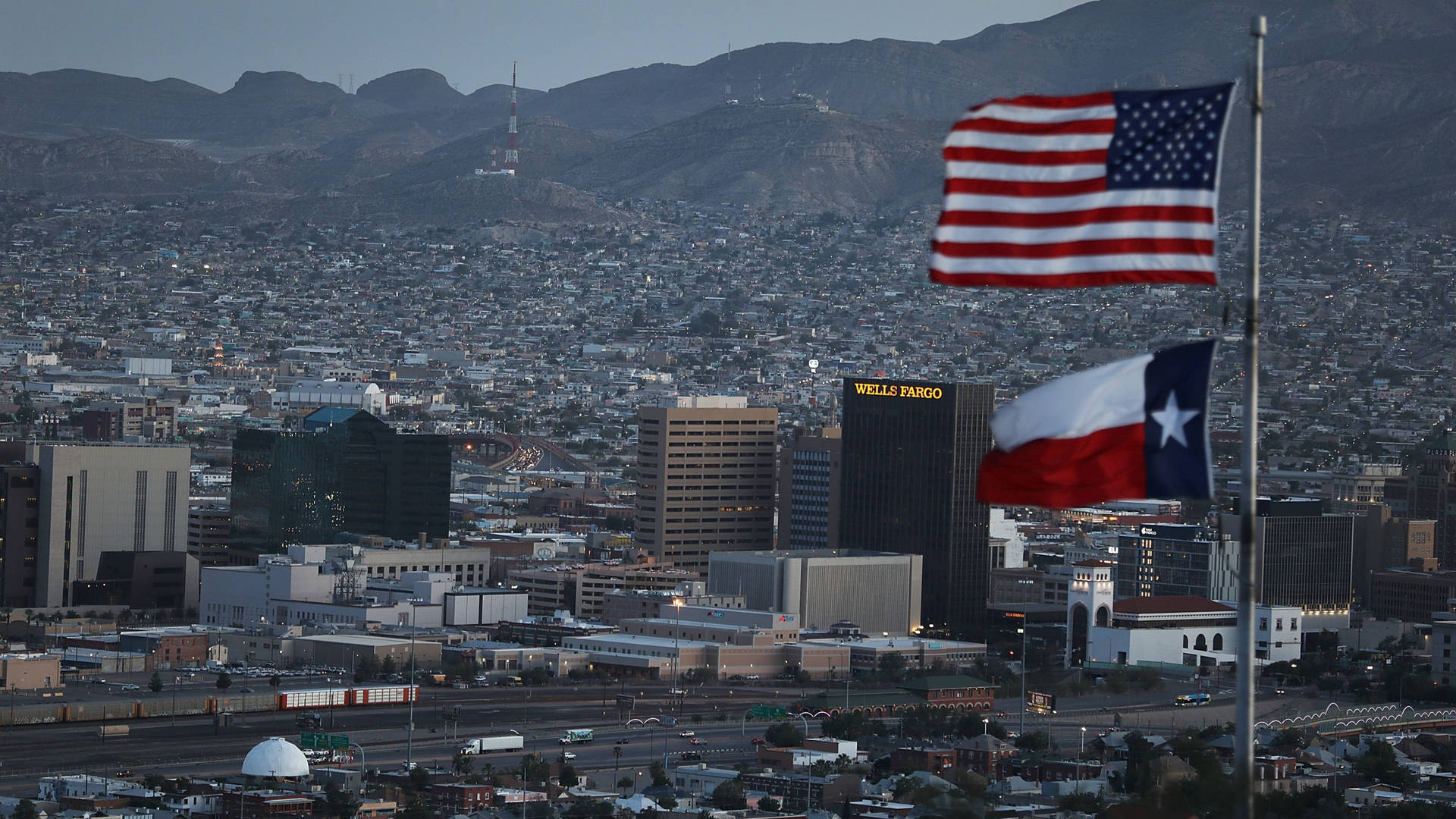 American And Texas Flags In El Paso Wallpaper