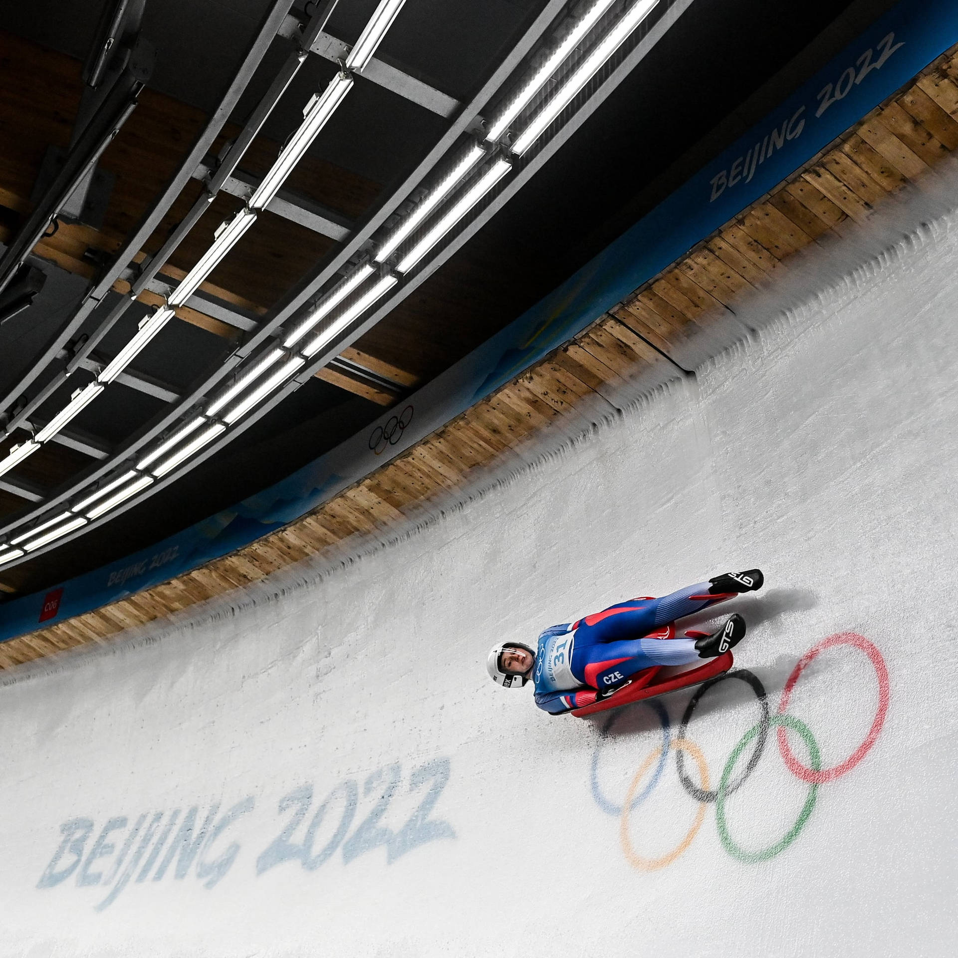 Americanoen La Modalidad De Luge Individual En Los Juegos Olímpicos De Invierno 2022 En Beijing. Fondo de pantalla