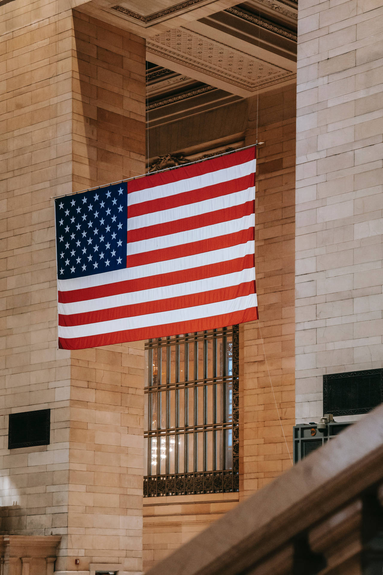 American Flag In Grand Central Terminal Background