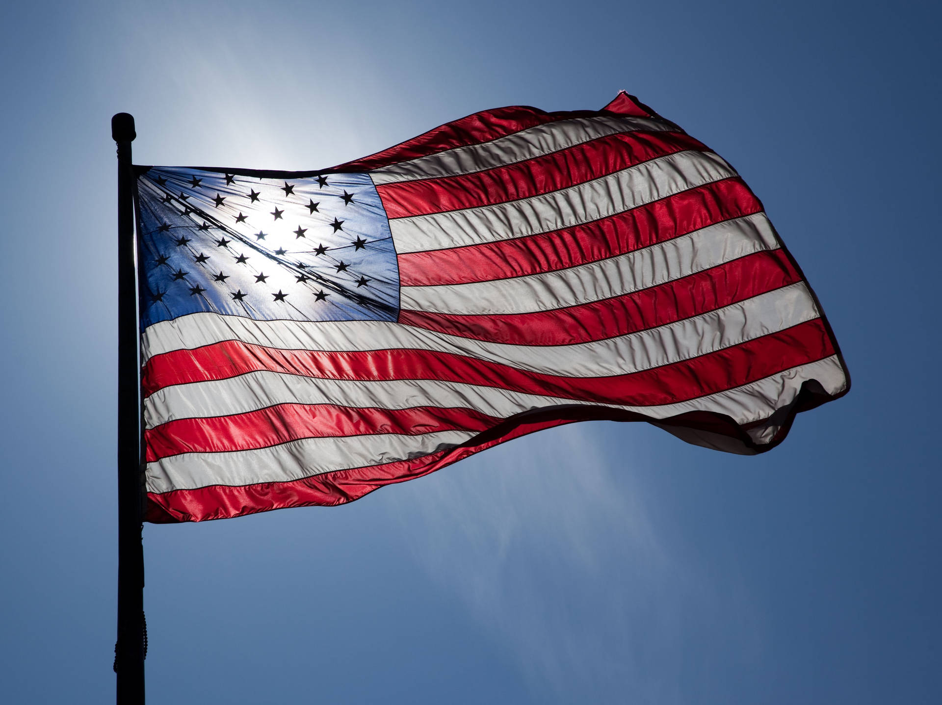 American Flag On A Pole Background