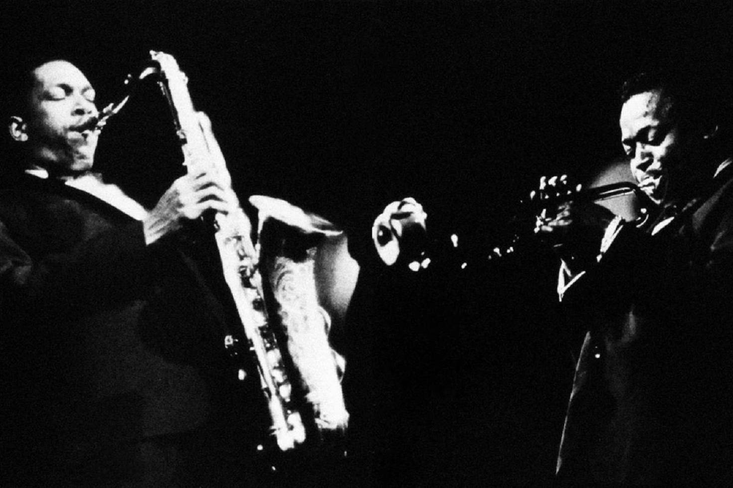 Vintage moment of American Jazz Legends, John Coltrane and Miles Davis Wallpaper