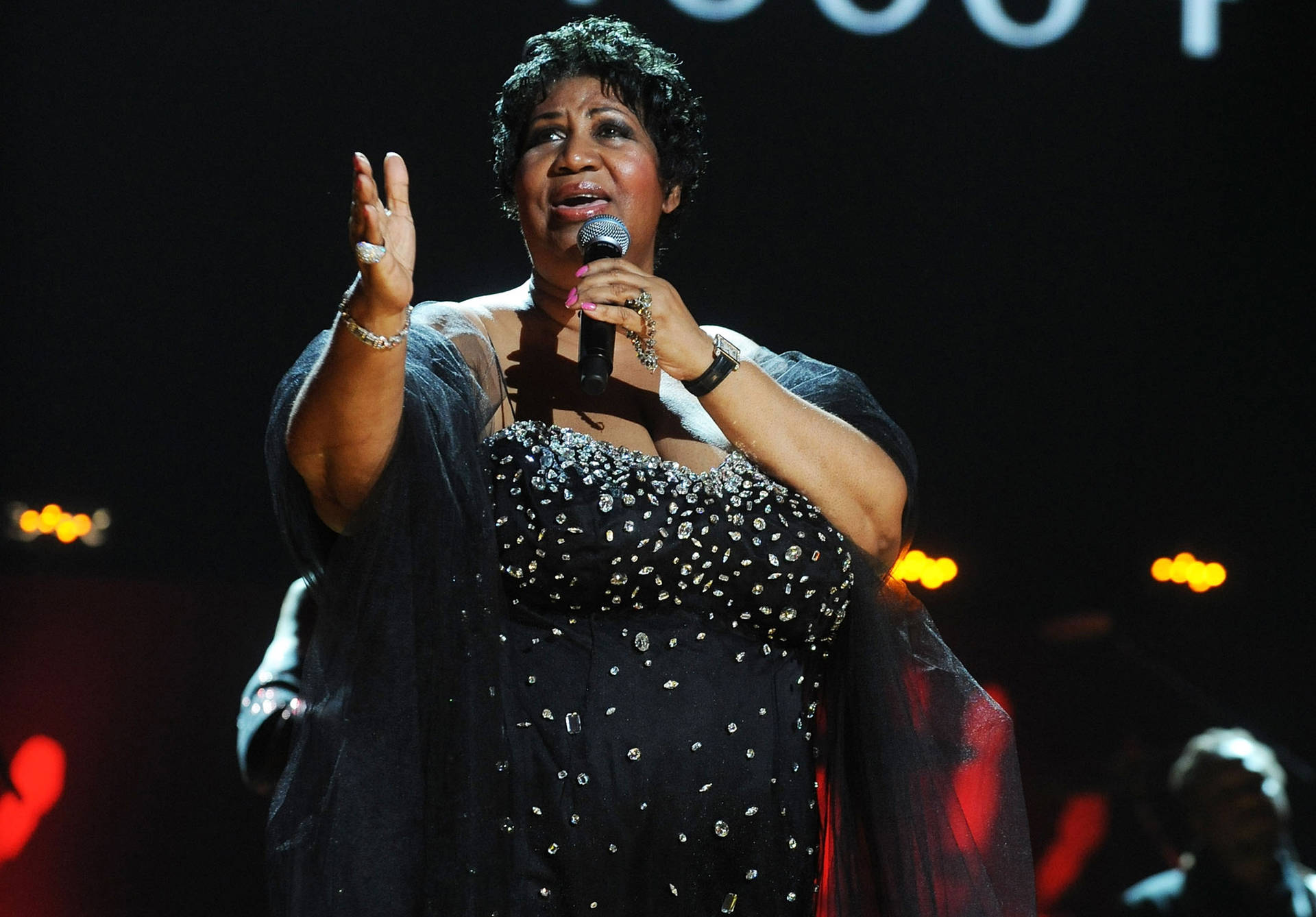 American Music Legend Aretha Franklin In Black Gown Background