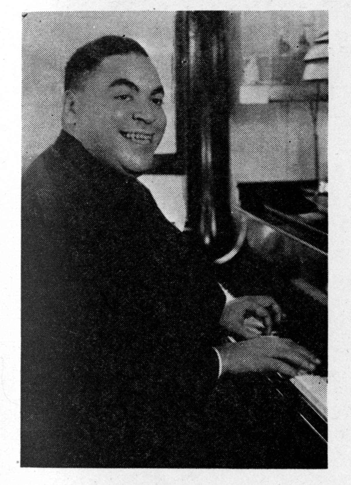 American Pianist Fats Waller Piano Performance Black And White Portrait Wallpaper