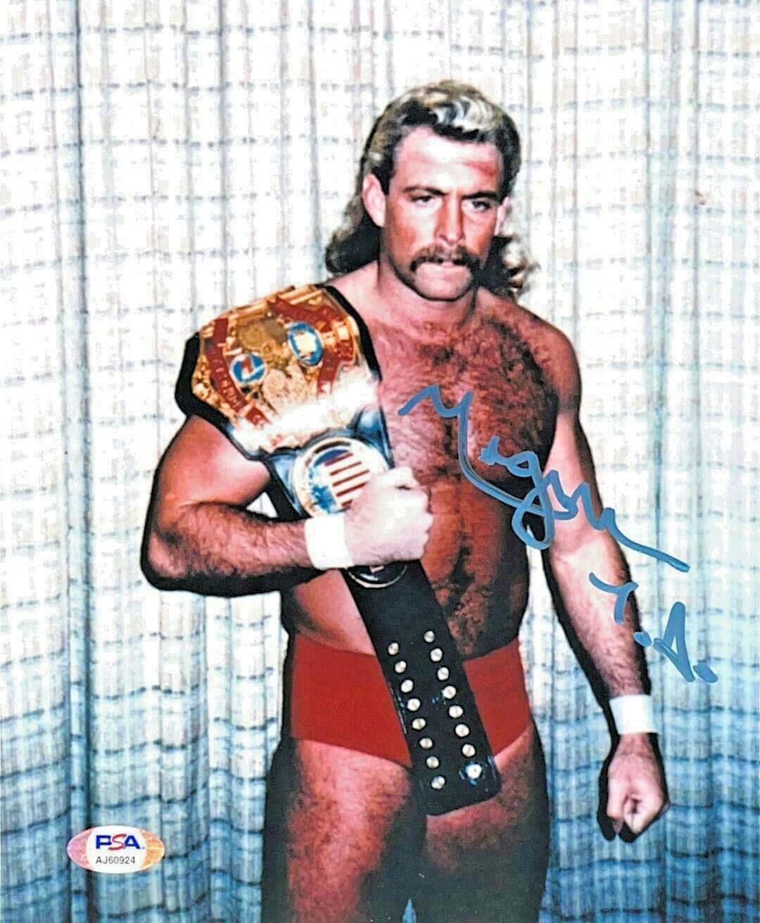 Magnum TA, legendary American professional wrestler, in an autographed portrait photo. Wallpaper