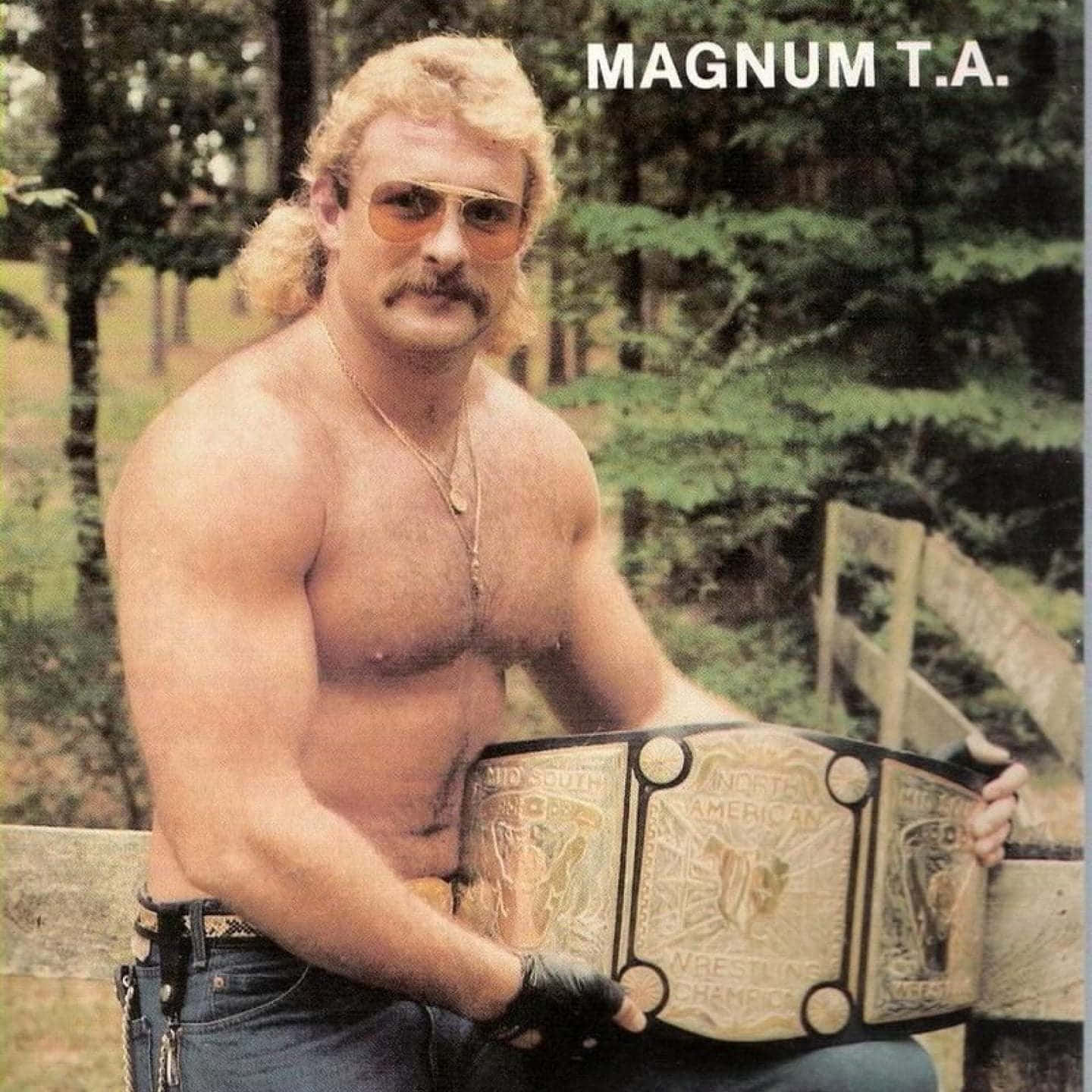 Lottatoredi Wrestling Professionista Americano Magnum Ta Con Una Cintura Da Campione. Sfondo