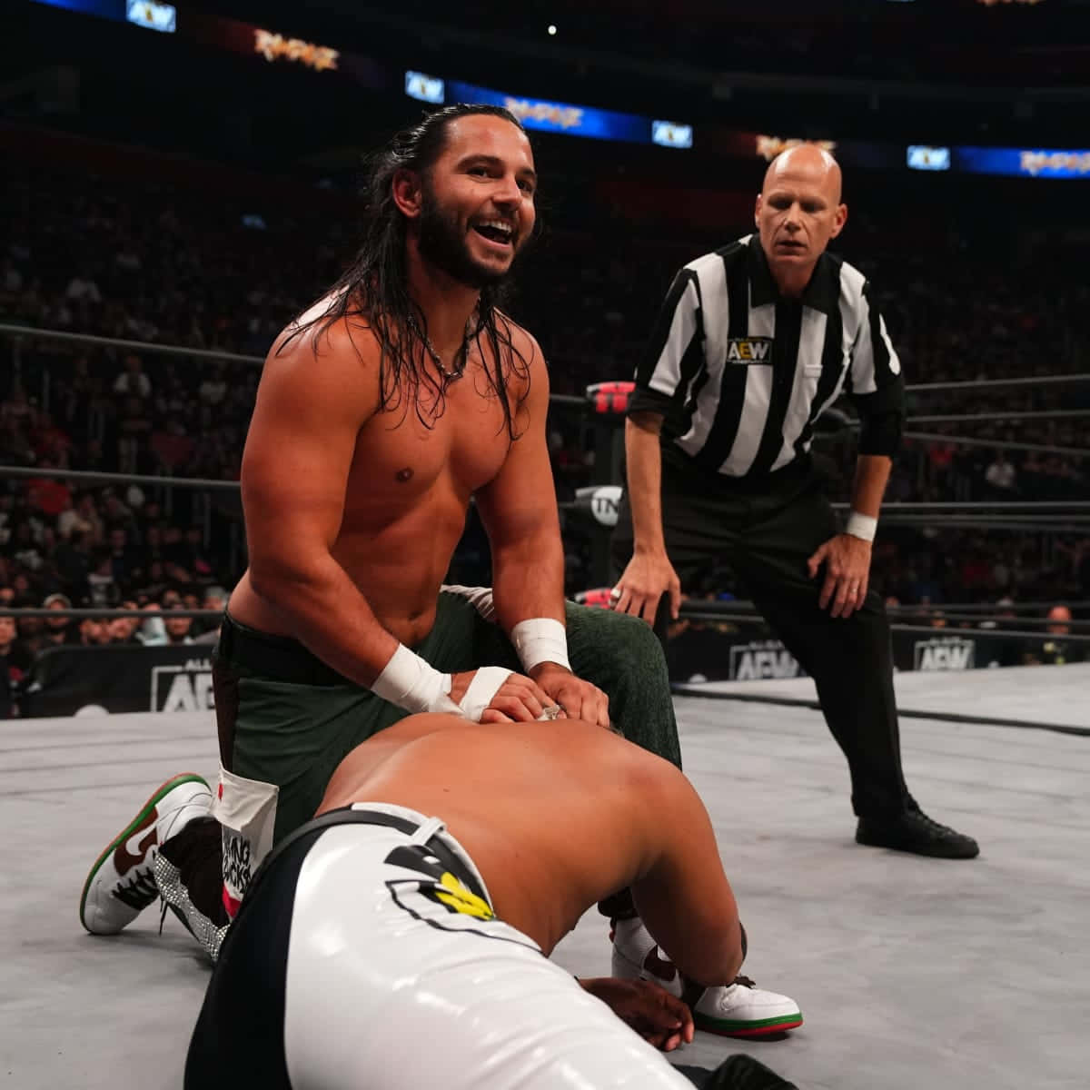 American Professional Wrestlers Matt Jackson Holding His Opponent Background