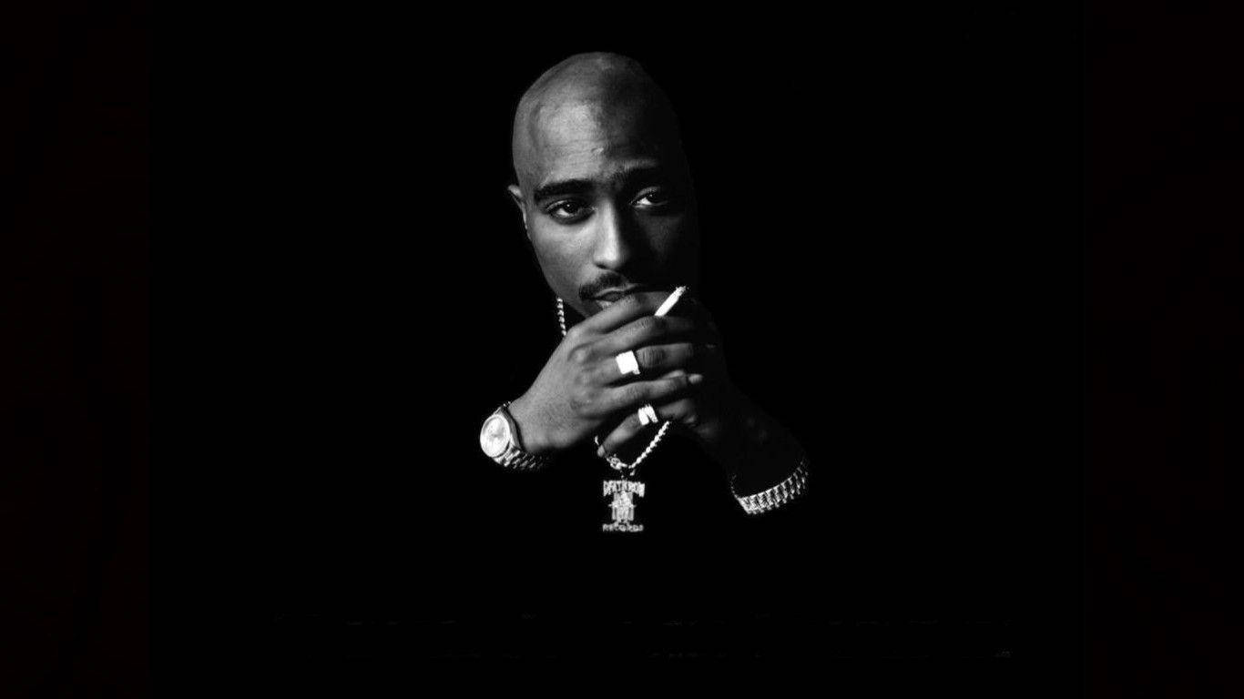 American Rapper Tupac Smoking Wallpaper