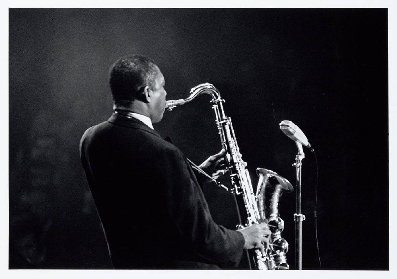 Amerikanskesaxofonisten John Coltrane I Baksidesvy I Fotografi. Wallpaper