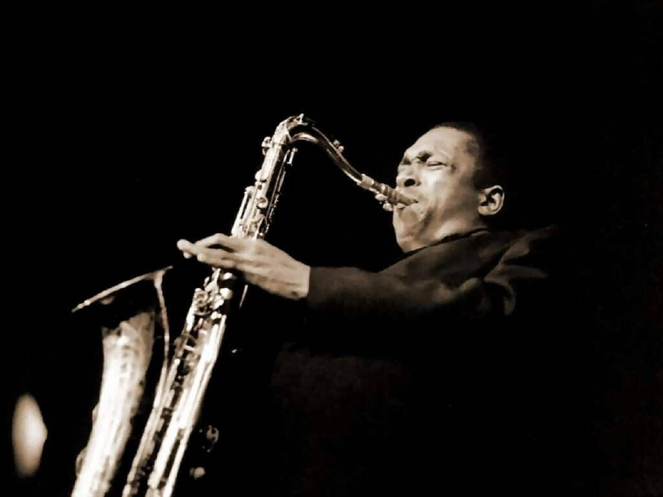 American Saxophonist John Coltrane European Tour 1961 Performance Wallpaper