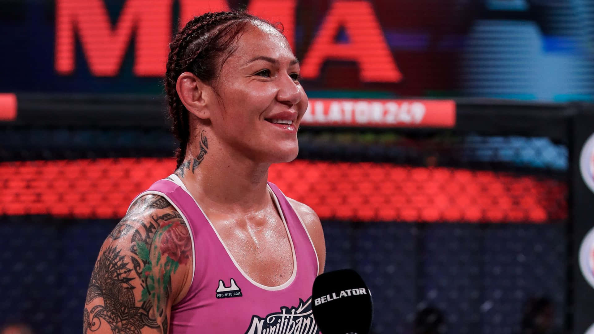 Caption: Empowering Smile of Cris Cyborg, the American UFC Athlete Wallpaper