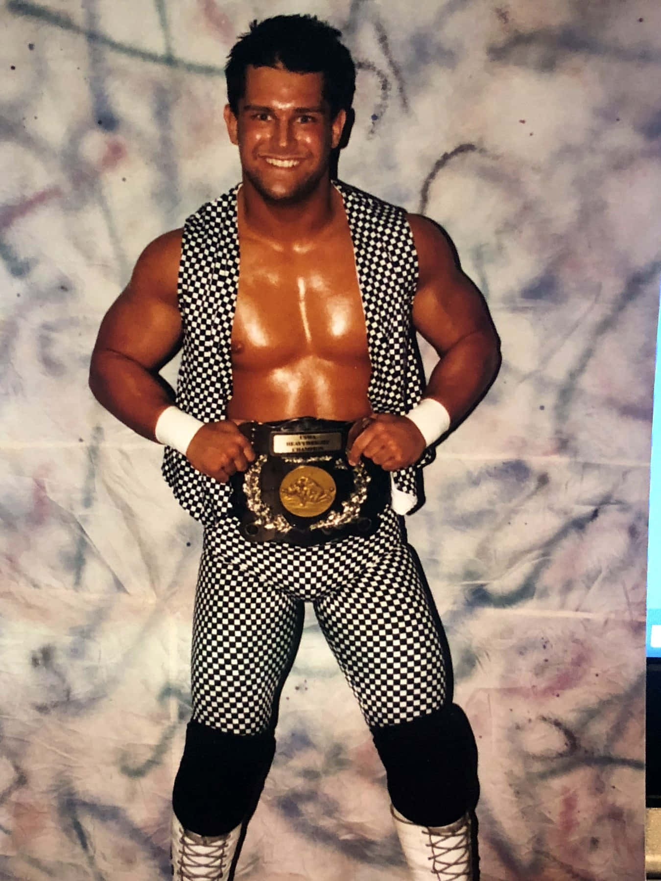 American Wrestler Brian Christopher With Championship Belt Wallpaper