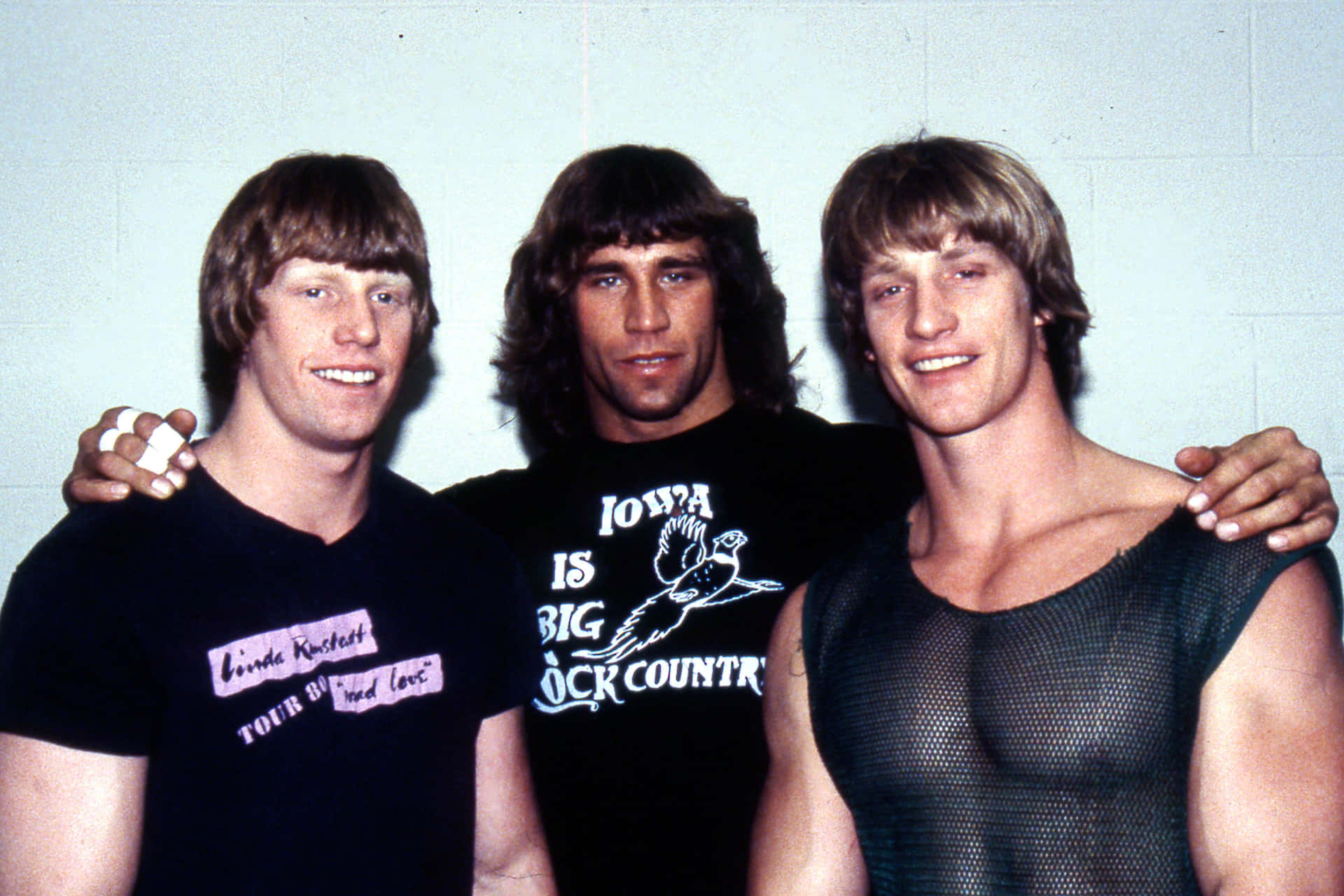 Amerikansk wrestler David Von Erich med Kerry og Kevin ved siden af Wallpaper