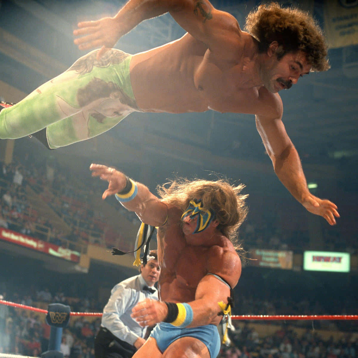 Luchadorestadounidense Ultimate Warrior Con Rick Rude Summerslam 1989 Fondo de pantalla