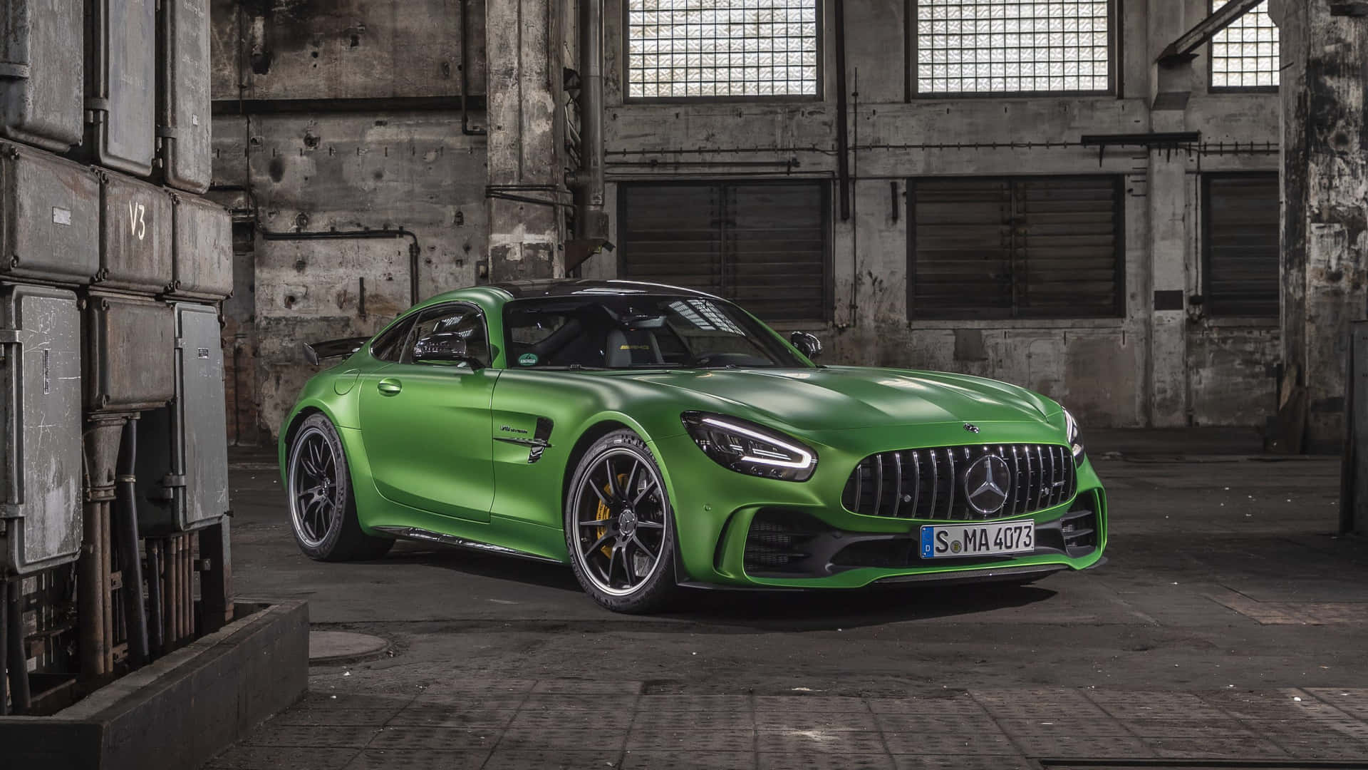 Green Mercedes Amg Gt R With Abandon Building Background