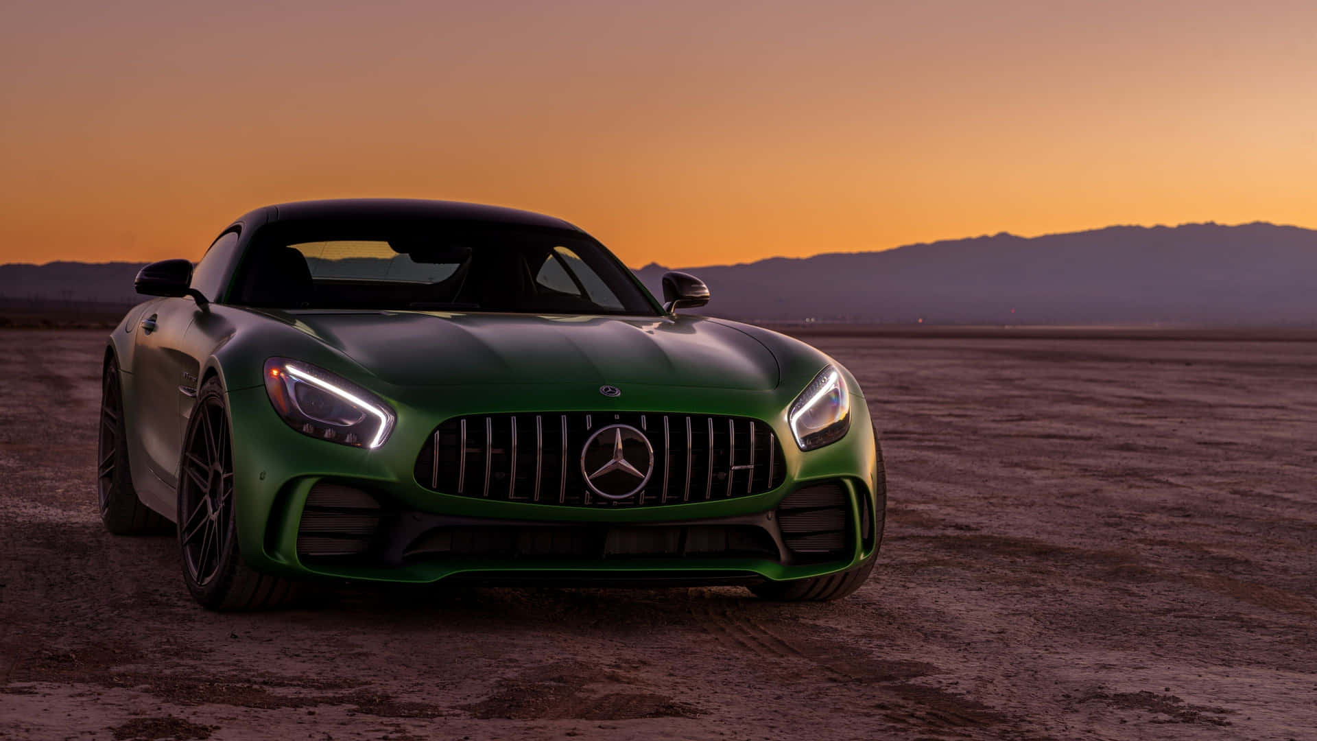 Green Mercedes Benz Amg Gt R With Sunset Sky Background