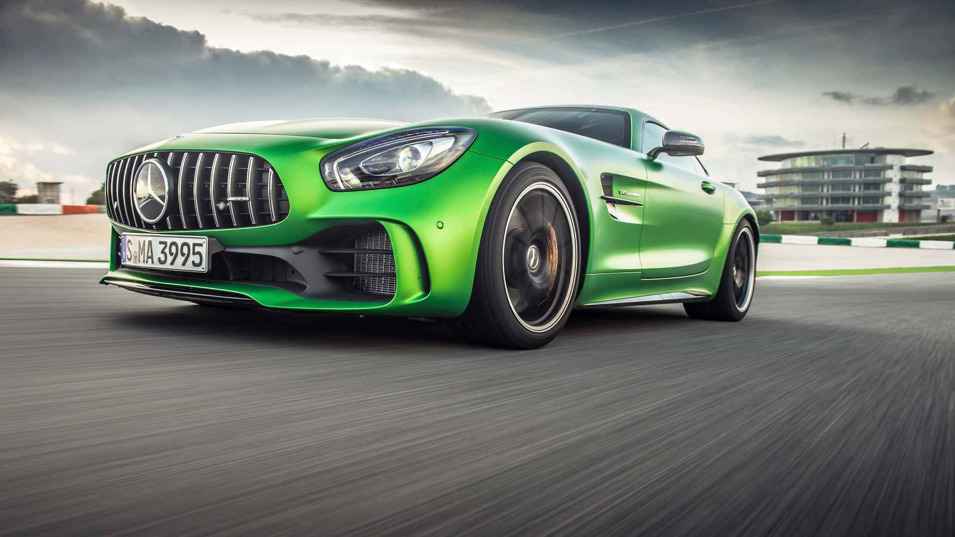 Zooming Green Colored Mercedes Amg Gt R Background