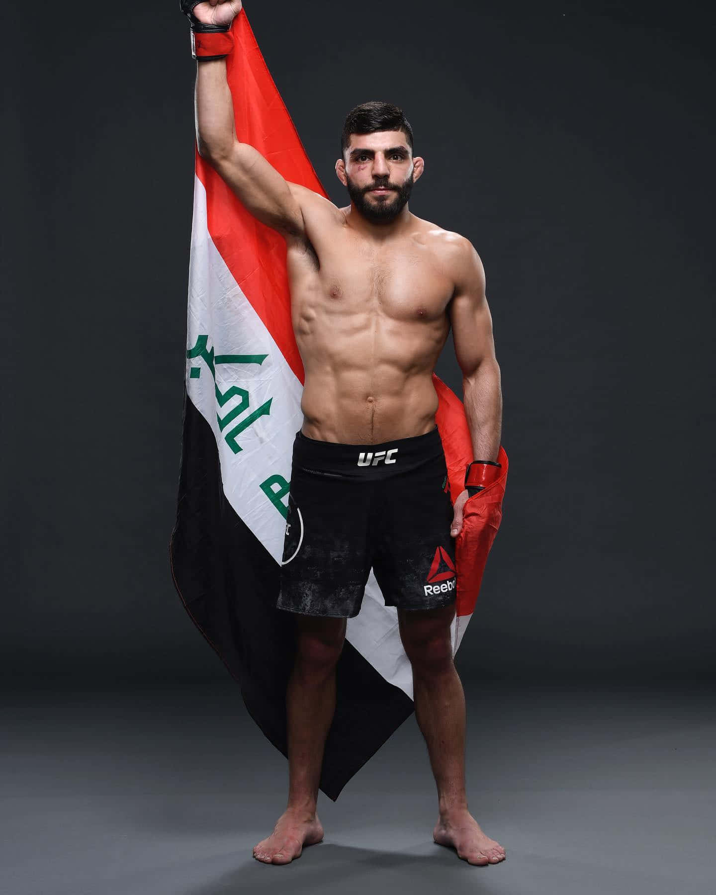Amir Albazi Raising Iraqi Flag Background