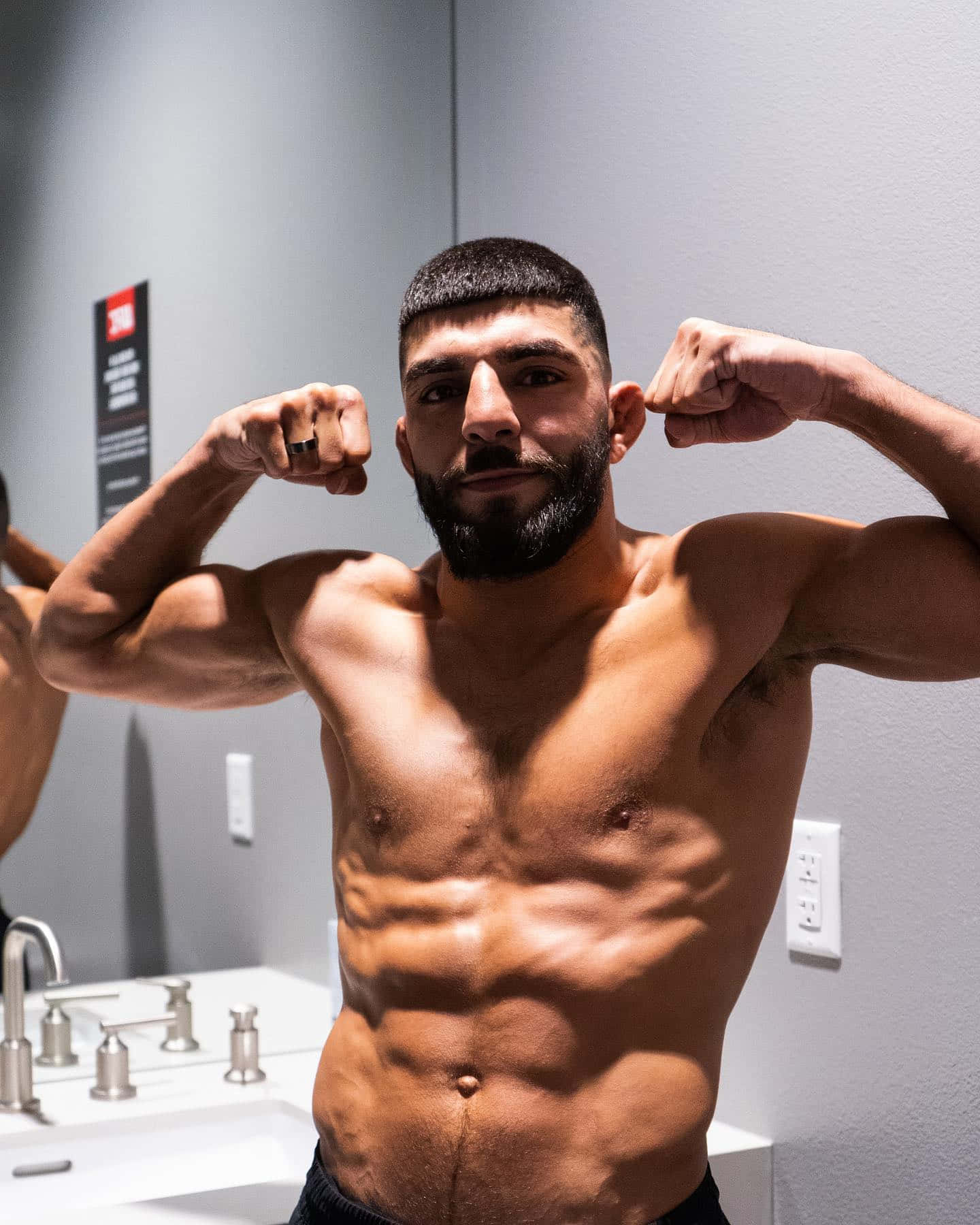 "Amir Albazi: MMA Fighter Flexing his Muscles" Wallpaper