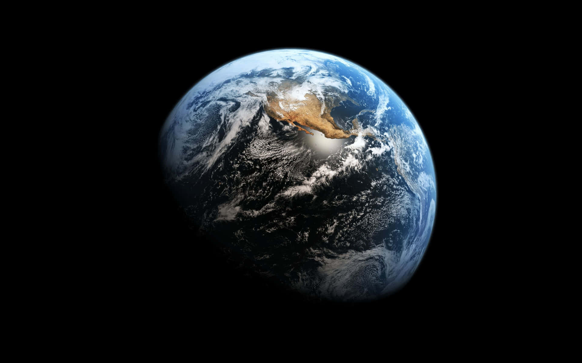 A Black Background With A Blue Earth Wallpaper