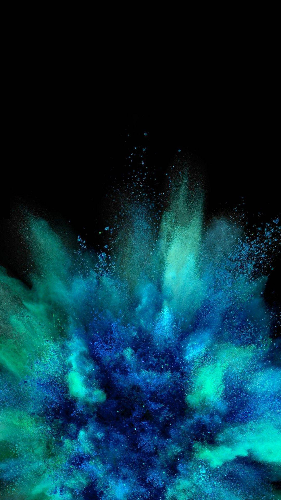 Enter a world of stunning blues with the Amoled Explosion of Blue Powders Wallpaper
